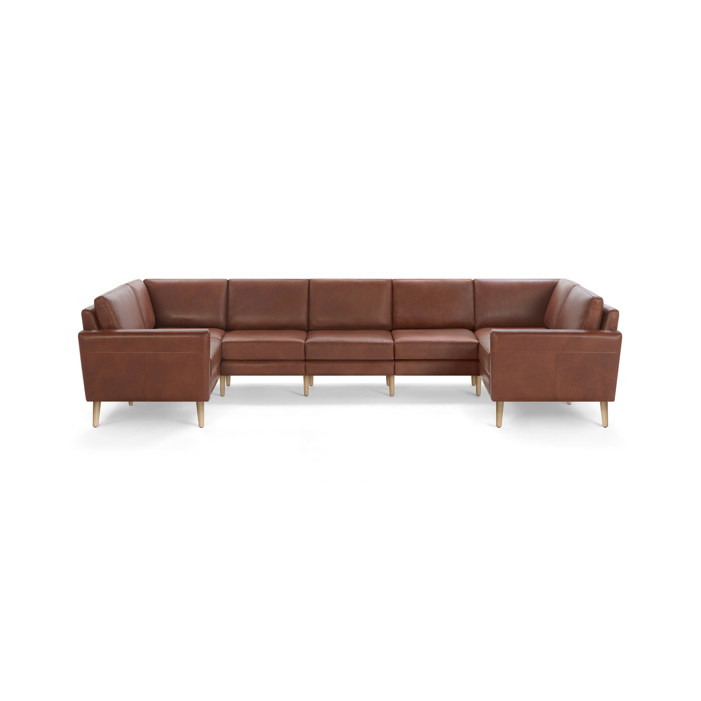 Large U-shaped sectional sofa in brown leather with wooden legs, featuring clean lines and cushioned seats and backrests.