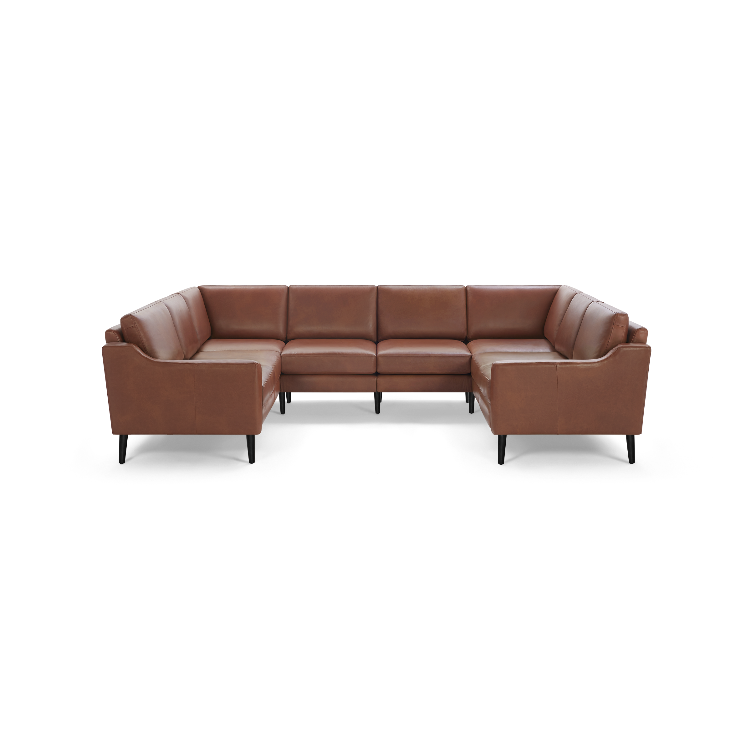 Large brown leather U-shaped sectional sofa with cushioned seats and backs, supported by slim black wooden legs.