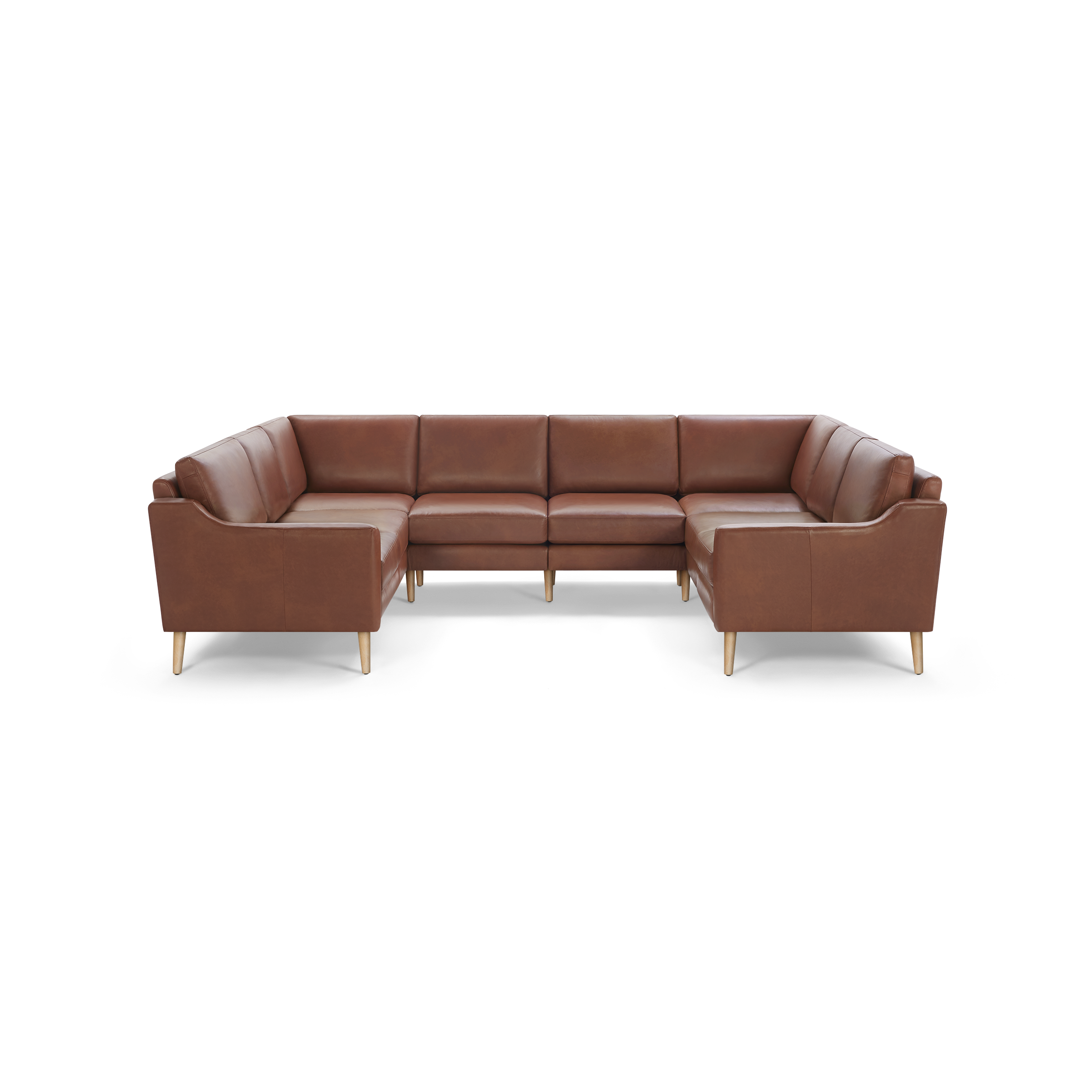 Brown leather sectional sofa with mid-century modern design, featuring wooden legs and clean lines, forming a U-shaped seating arrangement.