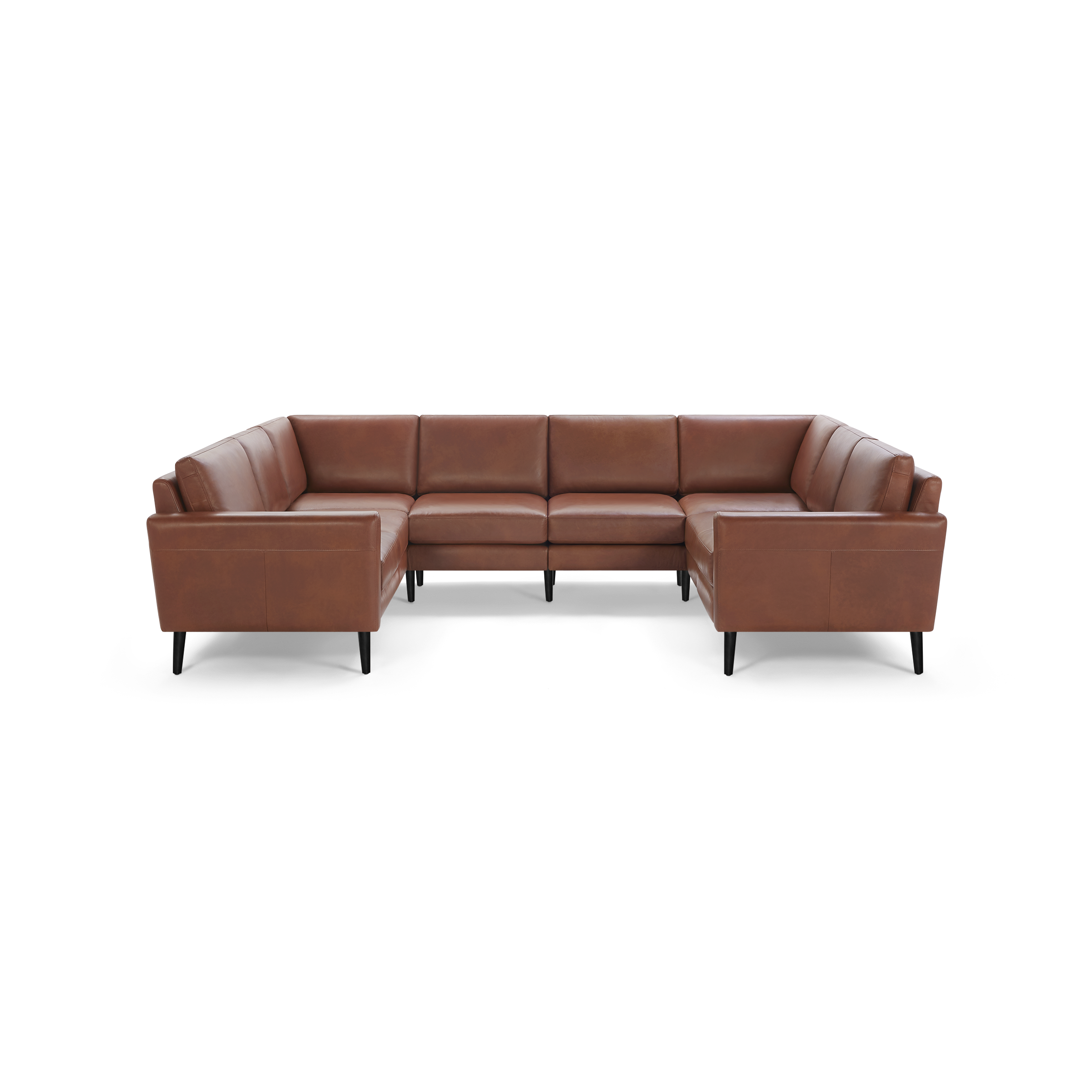 Brown leather U-shaped sectional sofa with black tapered legs, cushioned seats, and backrests, perfect for spacious living rooms.