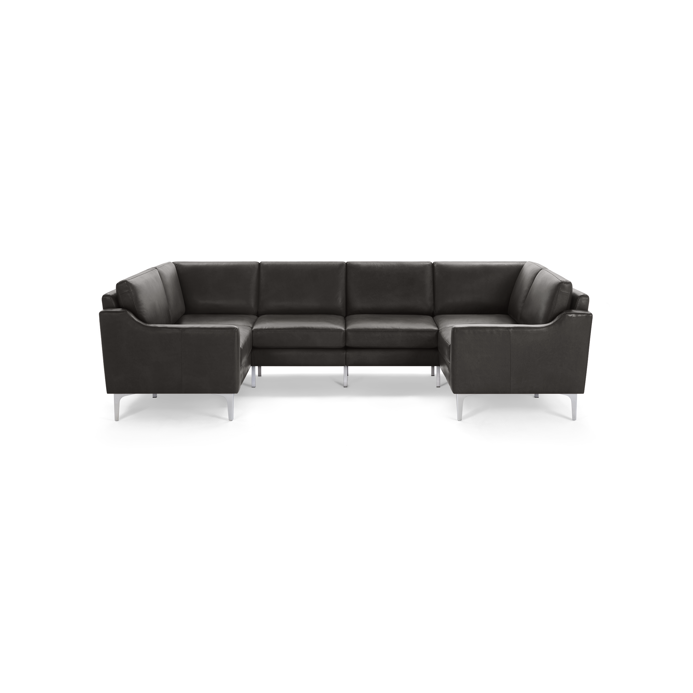 Modern U-shaped sectional sofa in dark gray leather with clean lines and metal legs isolated on black background.