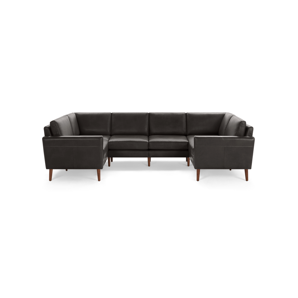 Dark grey leather U-shaped sectional sofa with wooden legs and clean, modern design.