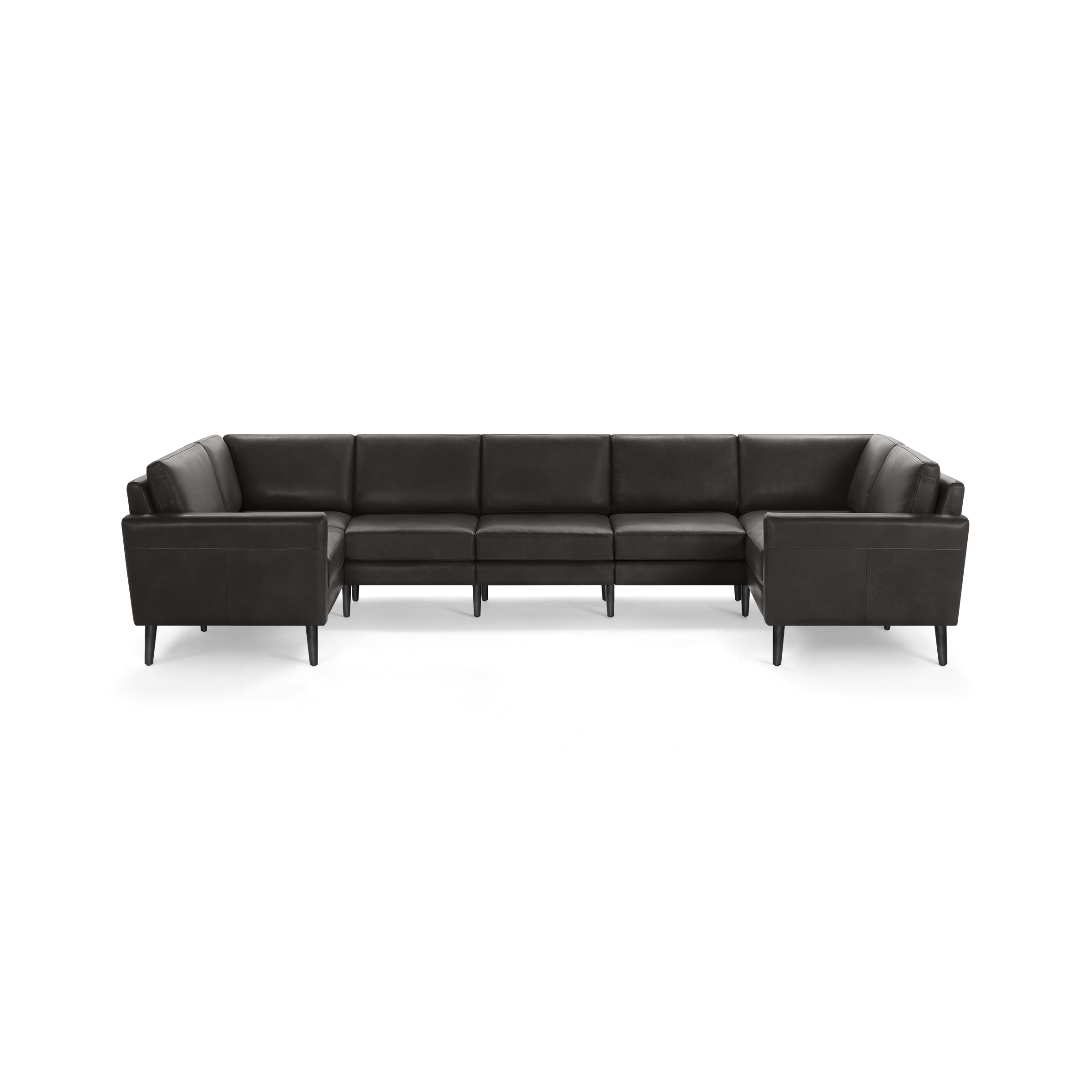 Large modern dark gray leather sectional sofa with straight arms and black legs, designed for spacious seating.