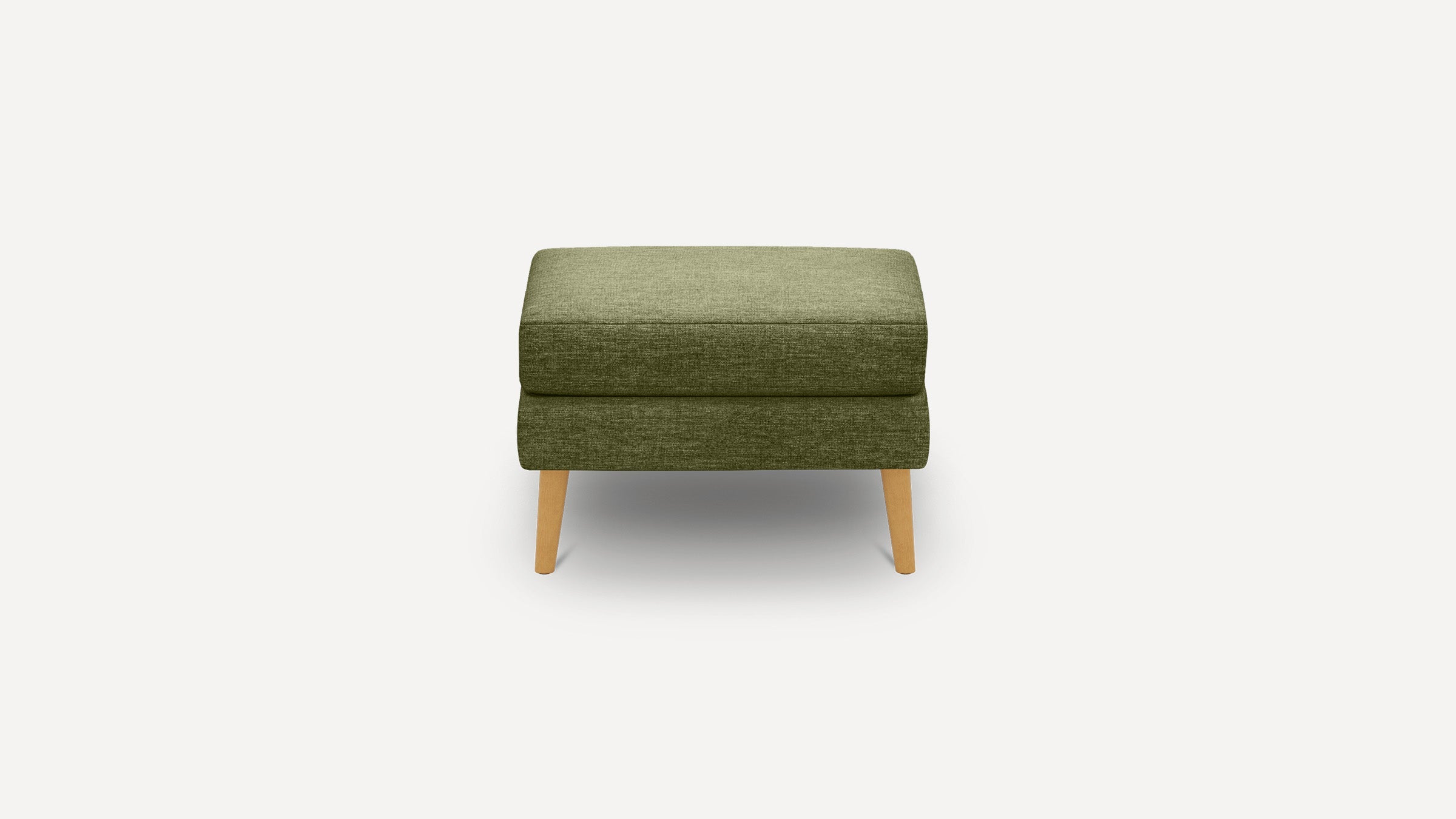 Square olive green upholstered ottoman with wooden tapered legs, shown against a plain white background.