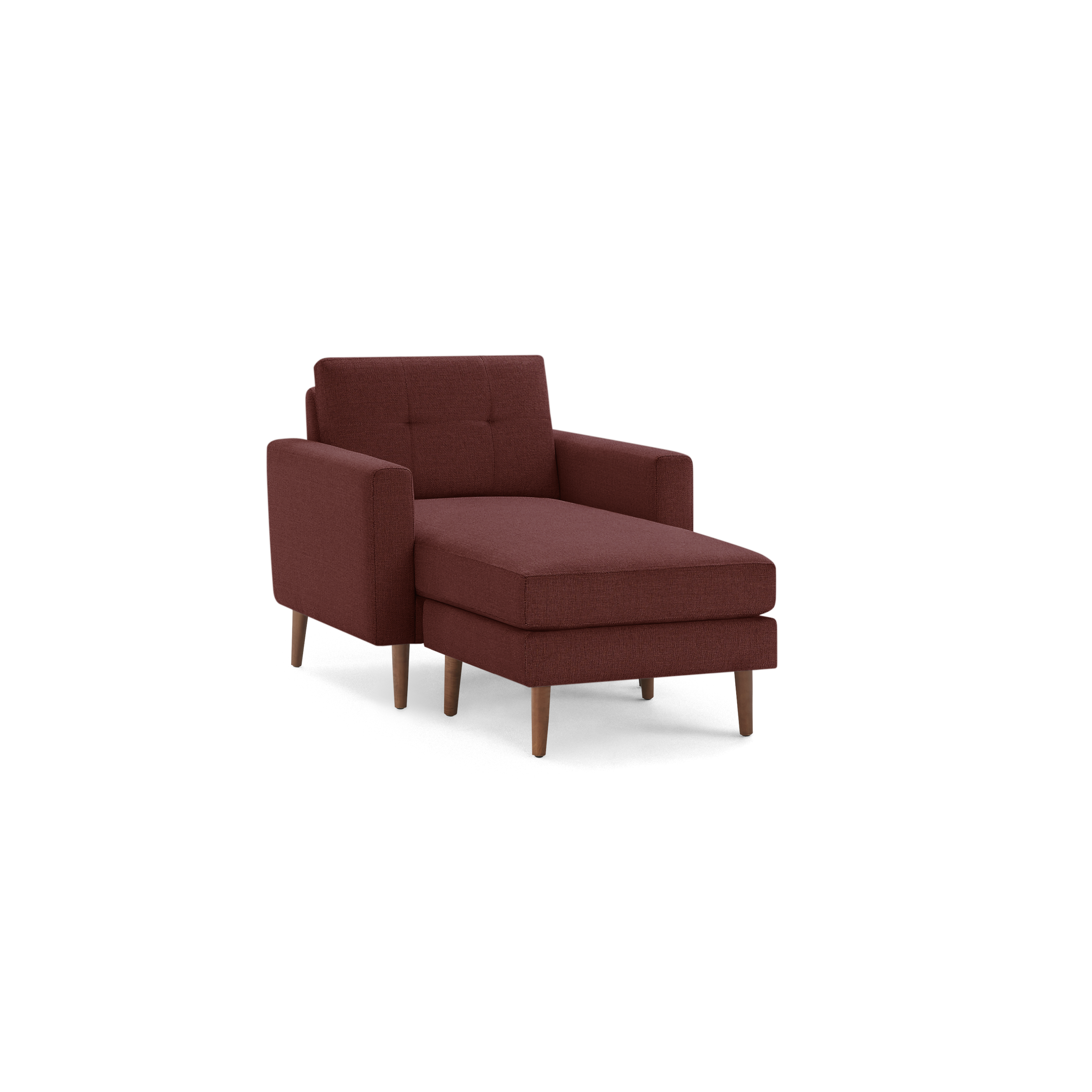 Modern deep red upholstered chaise lounge chair with wooden legs and tufted backrest, isolated on black background.