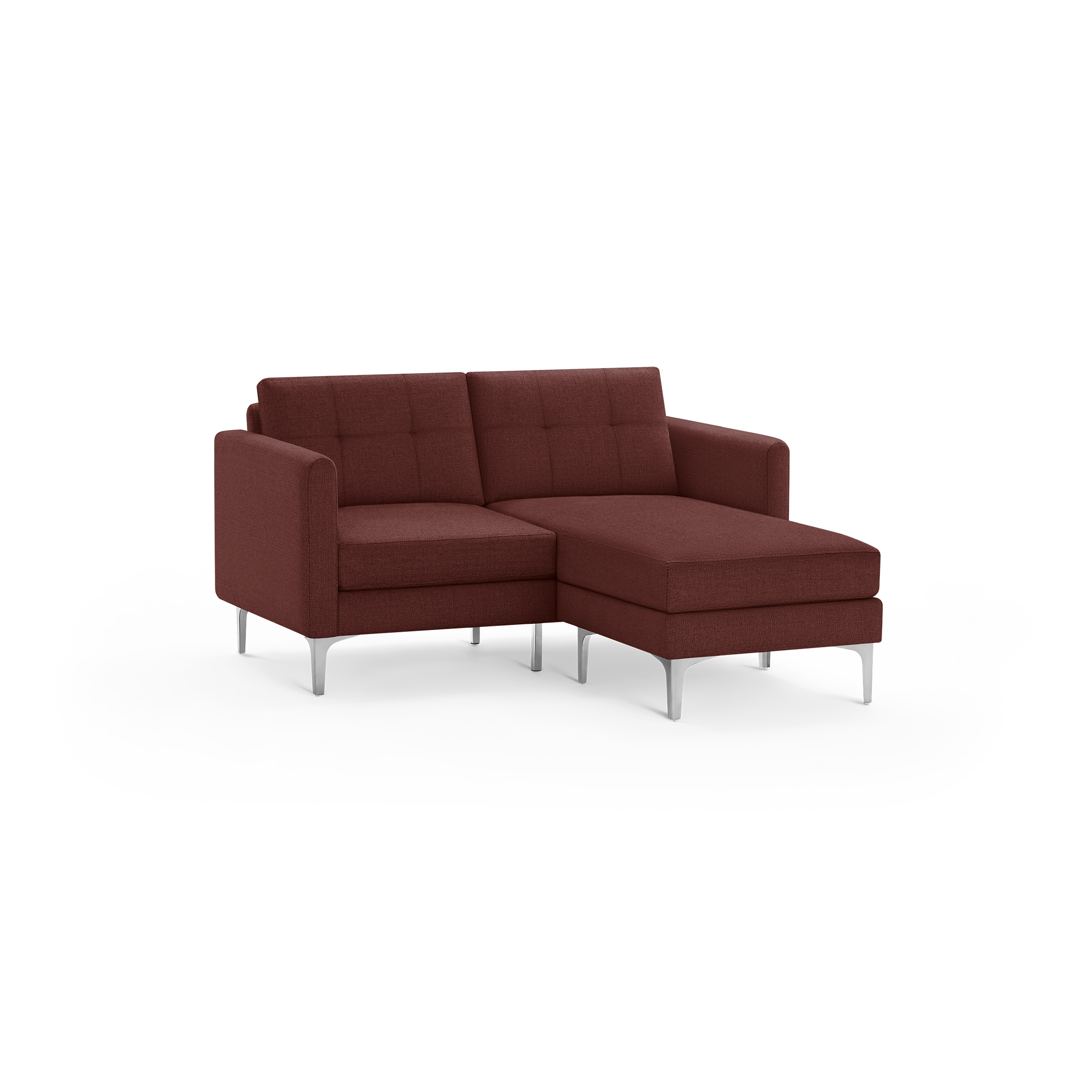 Modern burnt orange fabric sectional sofa with tufted back cushions, slim armrests, and silver metal legs, featuring a chaise lounge on the right side.