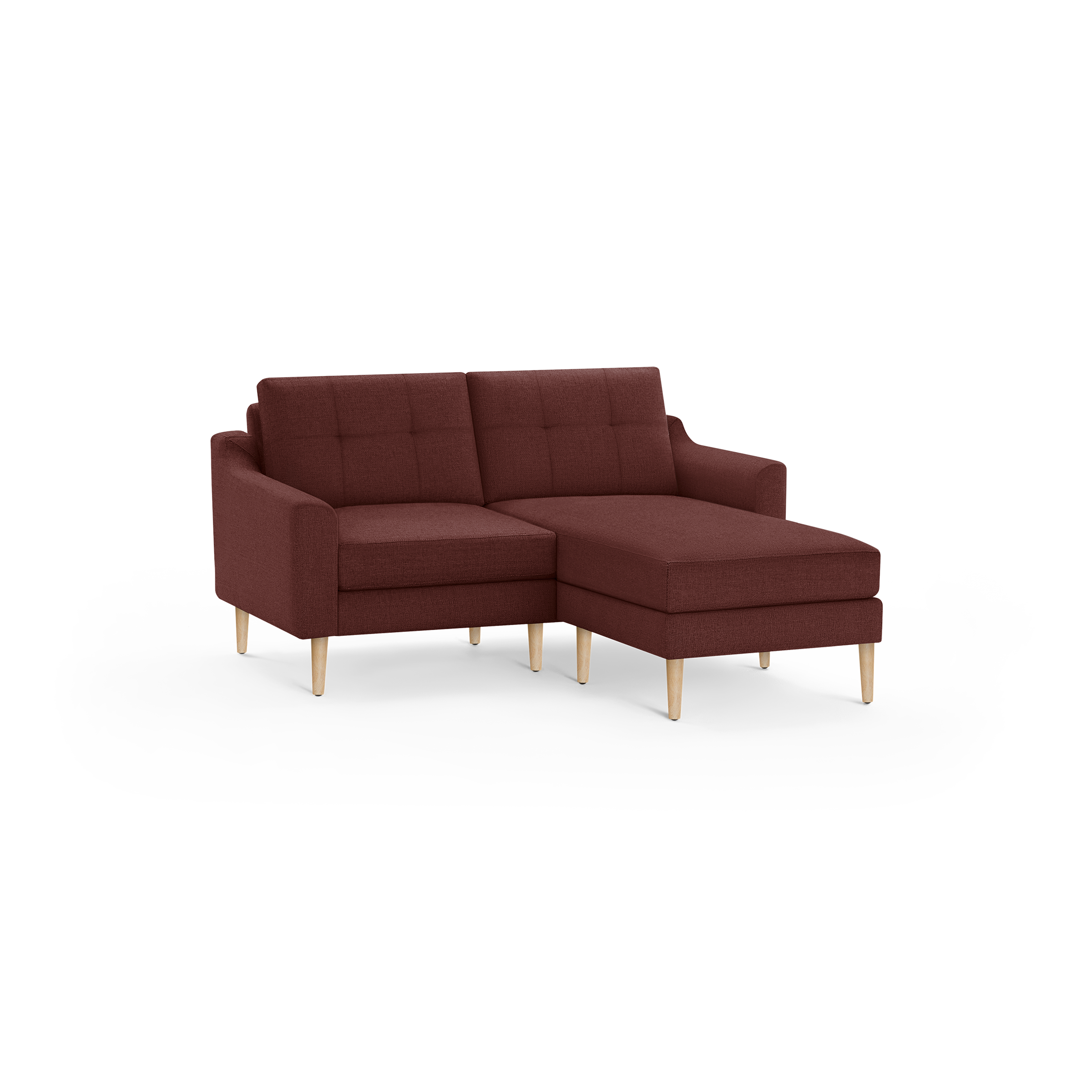 Modern L-shaped sectional sofa with tufted back cushions and wooden legs, upholstered in deep red fabric.