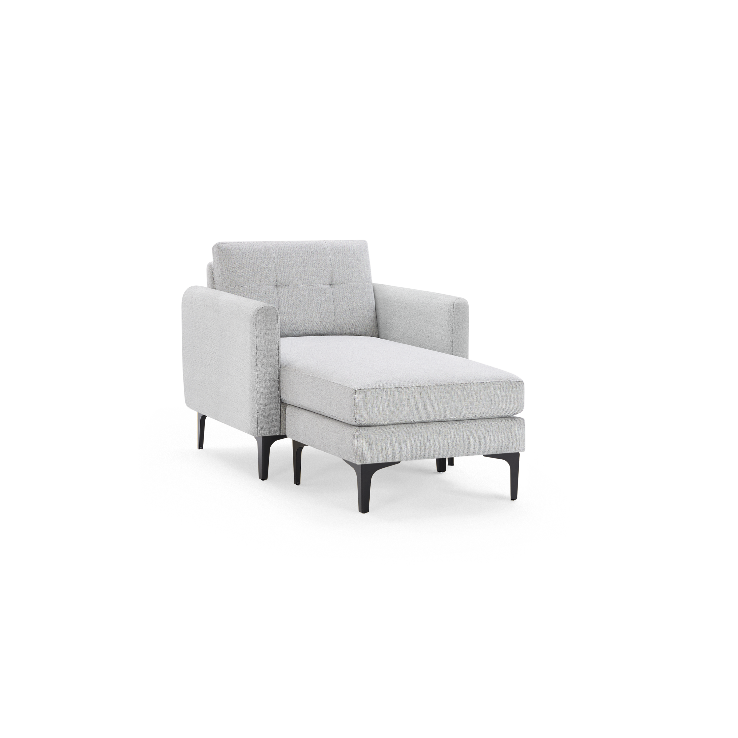 Light grey upholstered chaise lounge chair with tufted backrest and black slender legs, offering modern comfort and style.