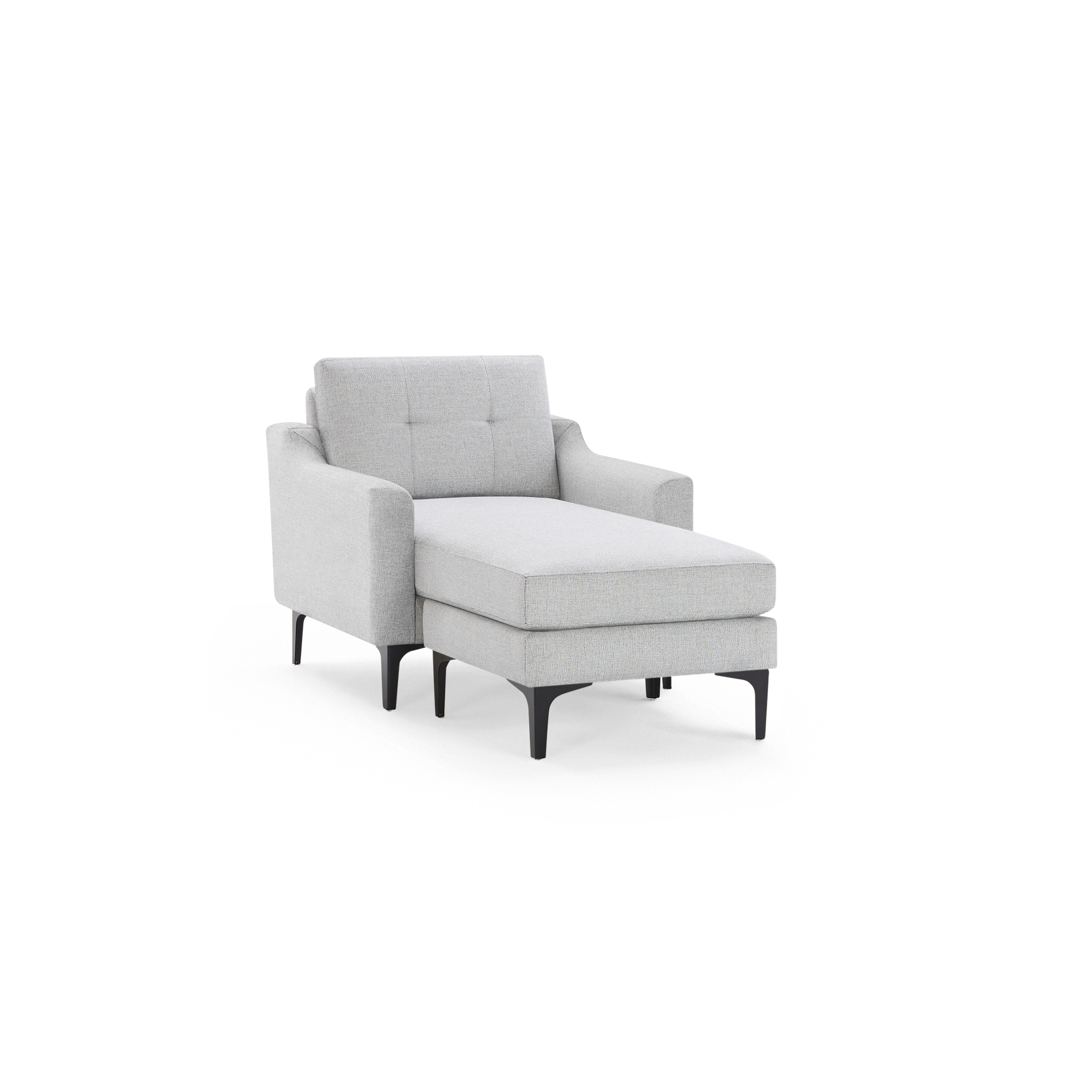 Light gray upholstered chaise lounge chair with tufted backrest, padded armrests, and black metal legs.