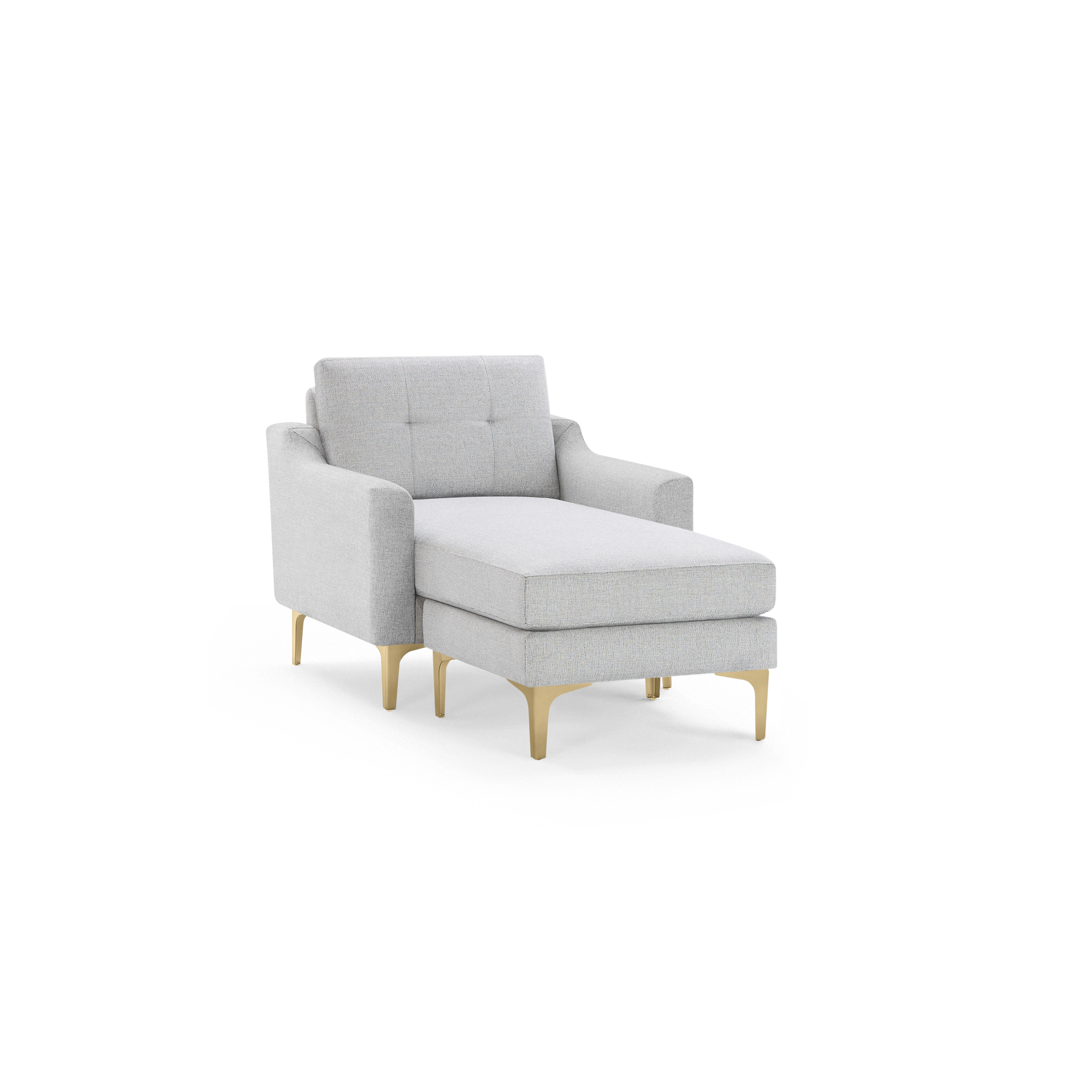 Light gray upholstered chaise lounge chair with tufted backrest and gold metal legs, shown on a black background.