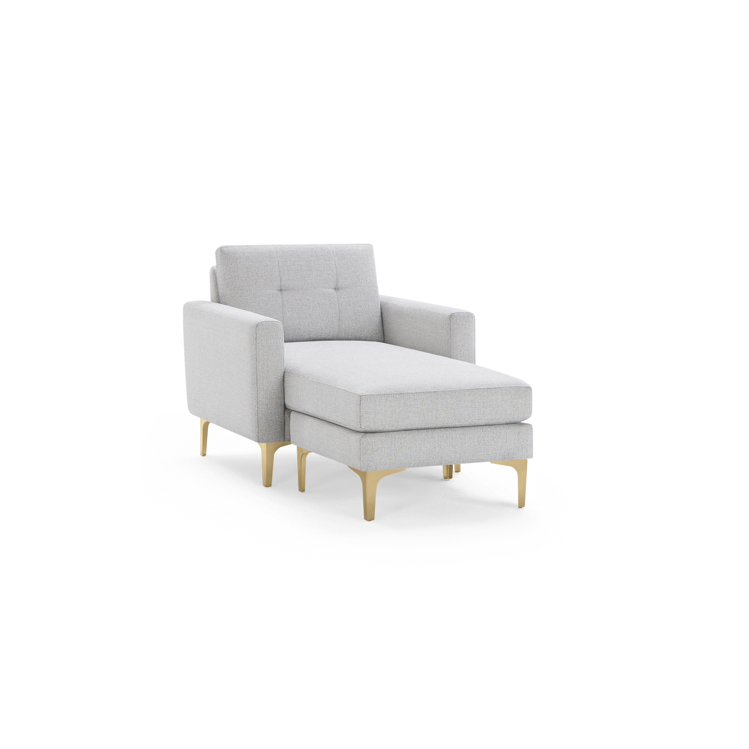 Light gray upholstered chaise lounge chair with tufted backrest, armrests, and gold-toned metal legs, isolated on black background.