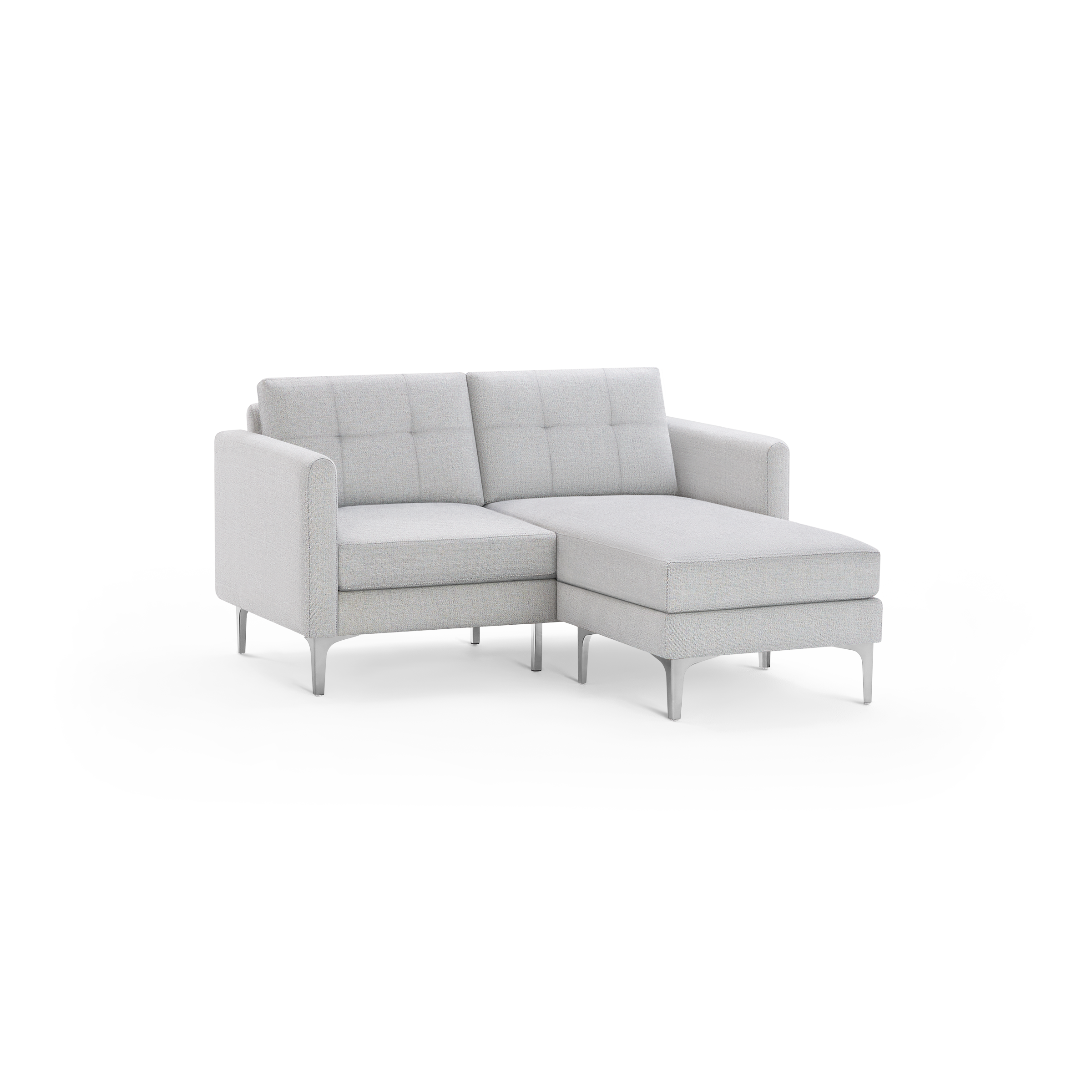 Light gray modern sectional sofa with tufted back cushions, metal legs, and an extended chaise lounge on the right side.