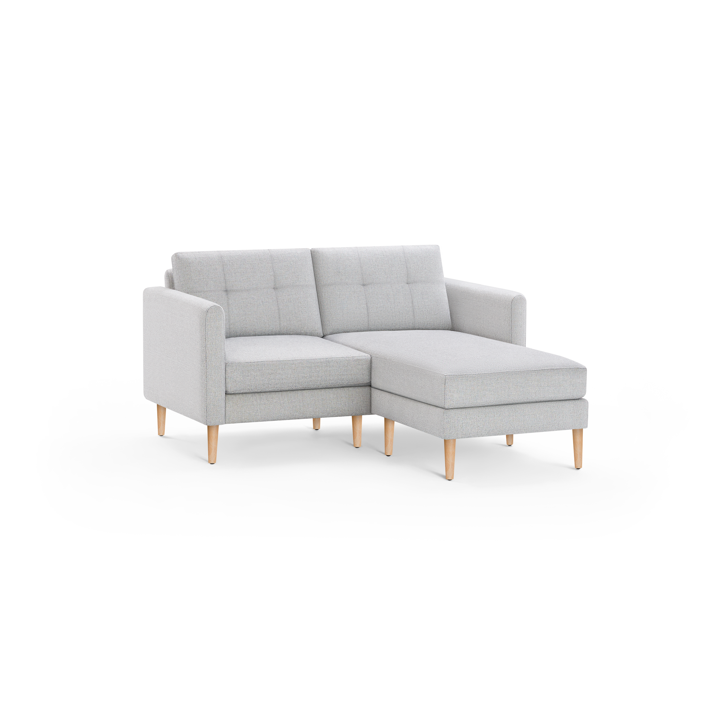 Light gray modern sectional sofa with tufted back cushions and wooden legs, featuring a right-side chaise lounge.