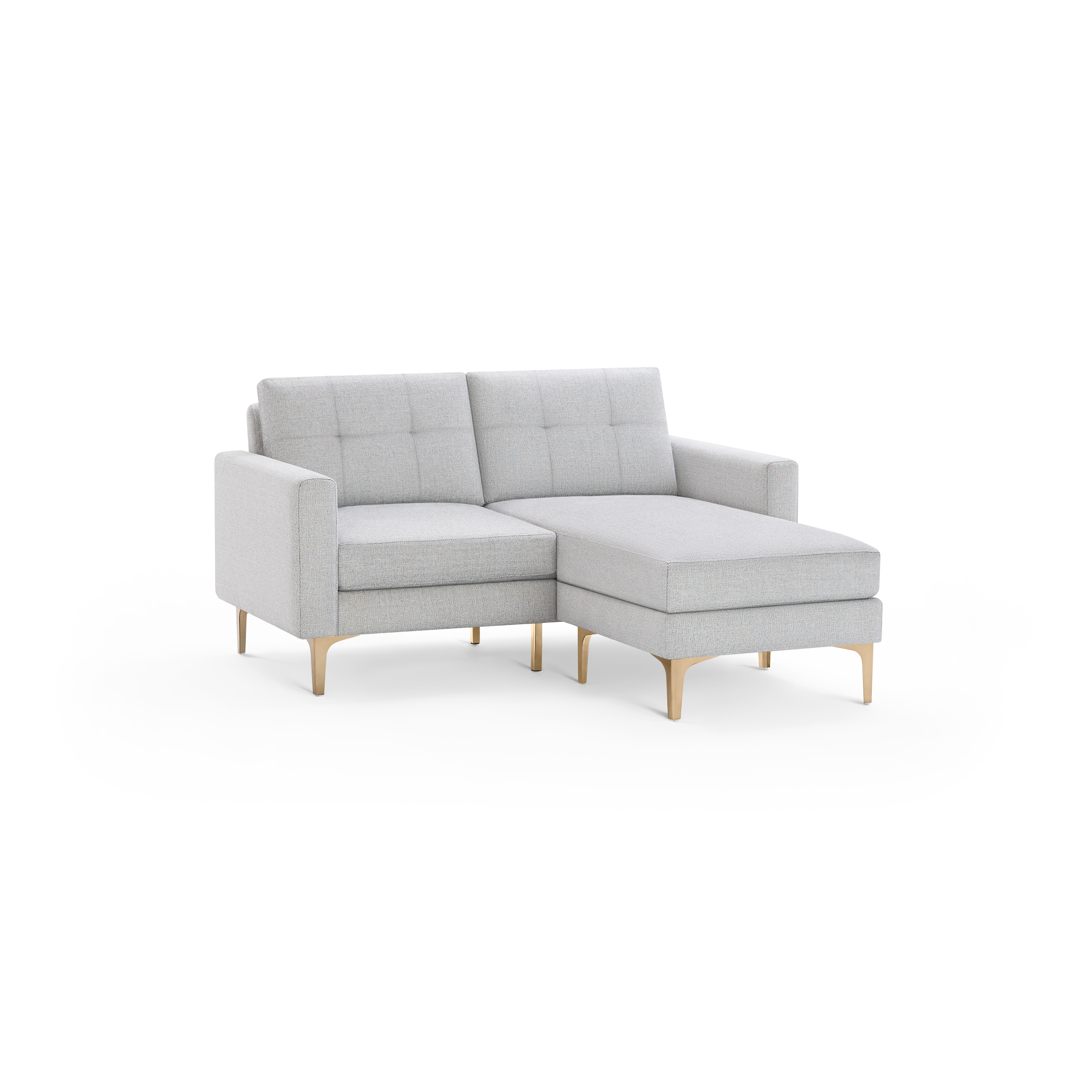 Light gray modern sectional sofa with tufted back cushions and wooden angled legs, featuring a chaise lounge on the right side.