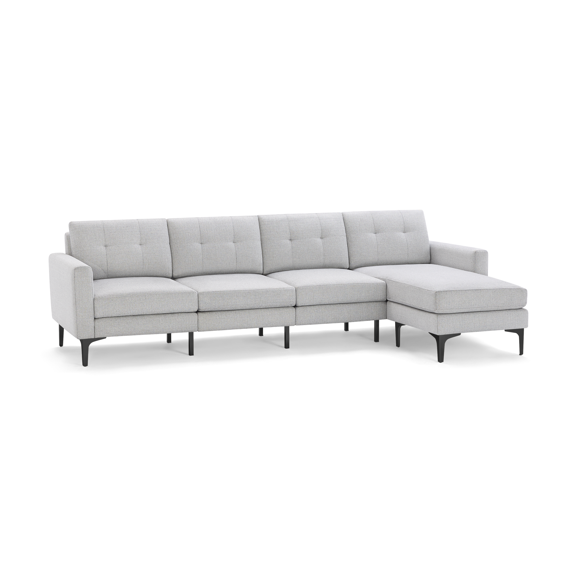 Light gray modern sectional sofa with tufted back cushions, slim armrests, and black metal legs, featuring a chaise lounge on the right side.