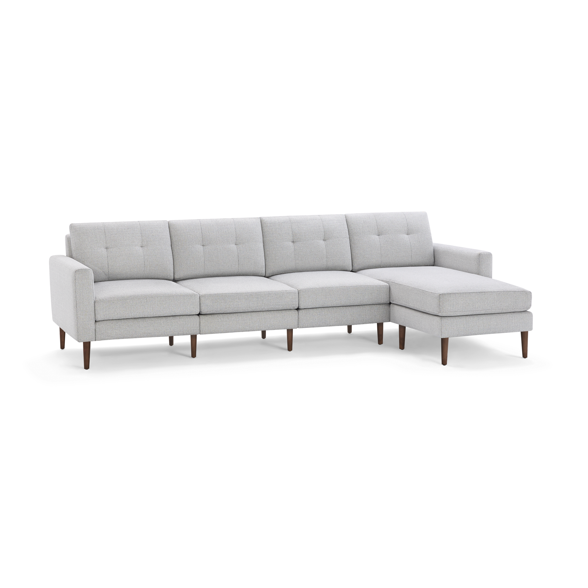 Light gray modern sectional sofa with tufted cushions and wooden legs, featuring a right-side chaise lounge.