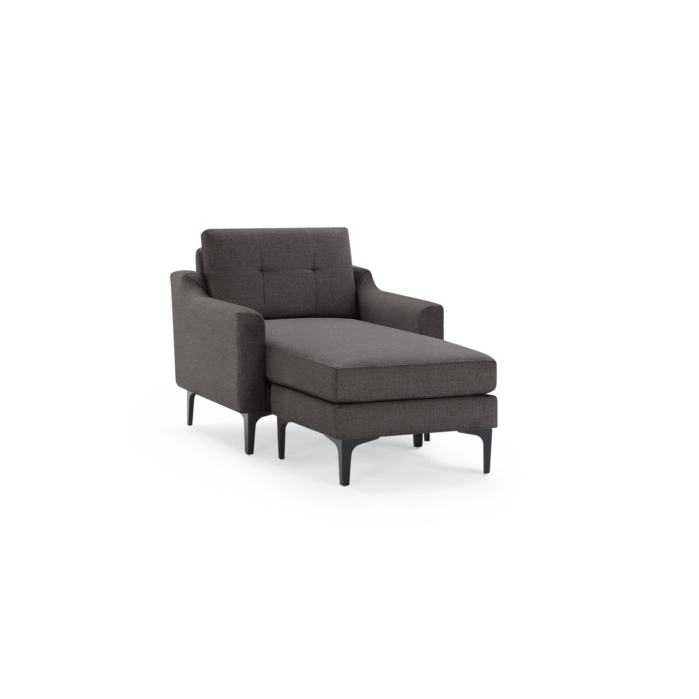 Dark gray upholstered armchair with extended chaise lounge, tufted backrest, and black slim legs, isolated on black background.