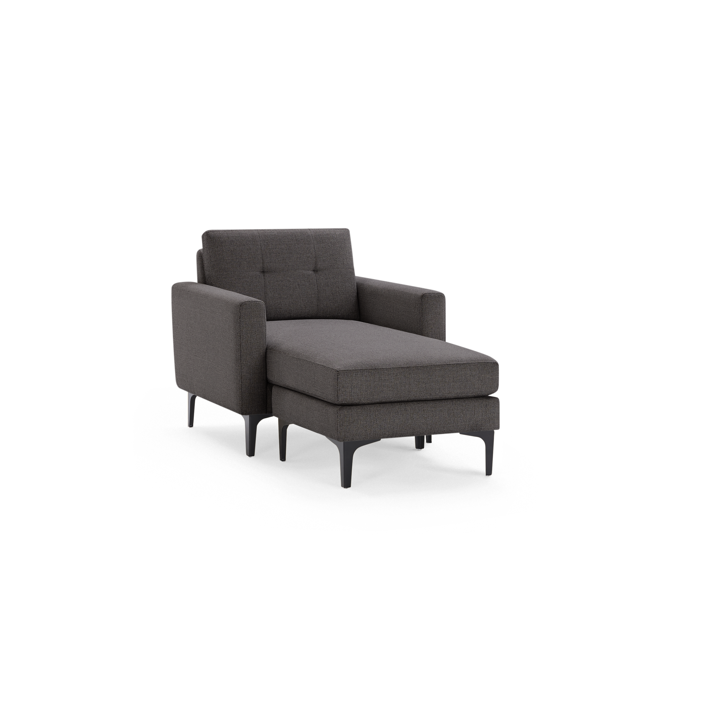 Dark gray upholstered chaise lounge chair with tufted backrest, high armrests, and black tapered legs on a black background.