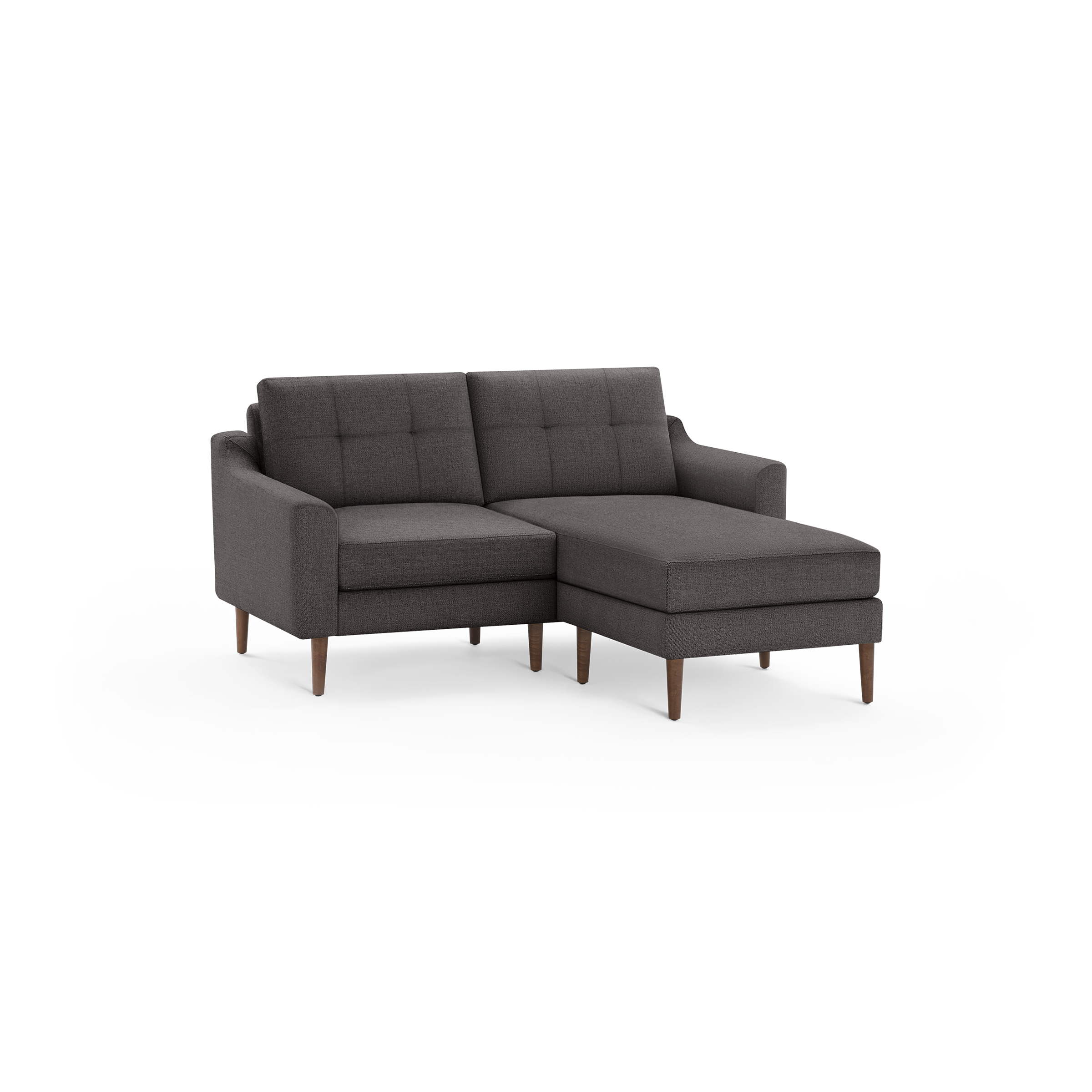 Dark gray fabric chaise sofa with tufted cushions and wooden tapered legs, featuring a right-side extended chaise lounge.
