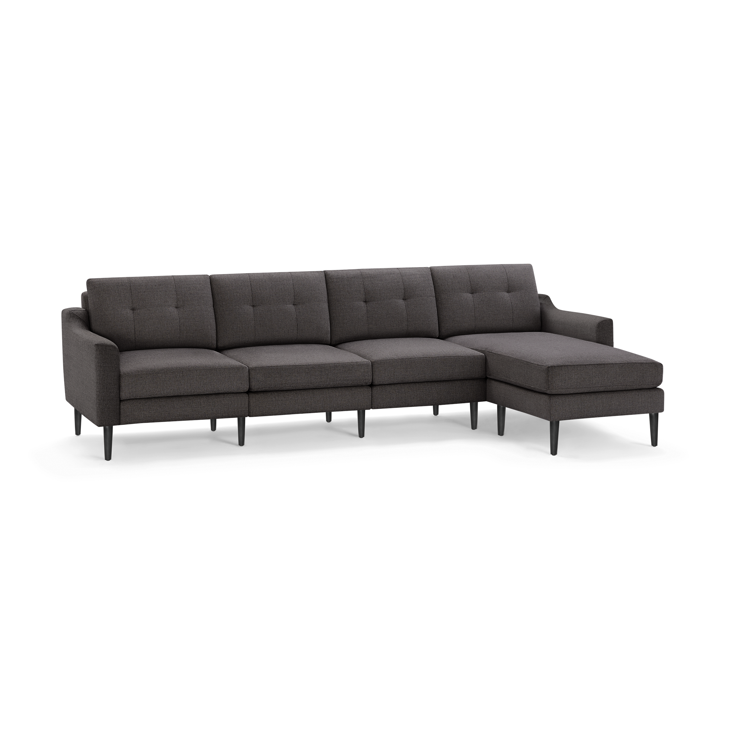Dark gray modern sectional sofa with a chaise lounge on the right side and tufted back cushions.