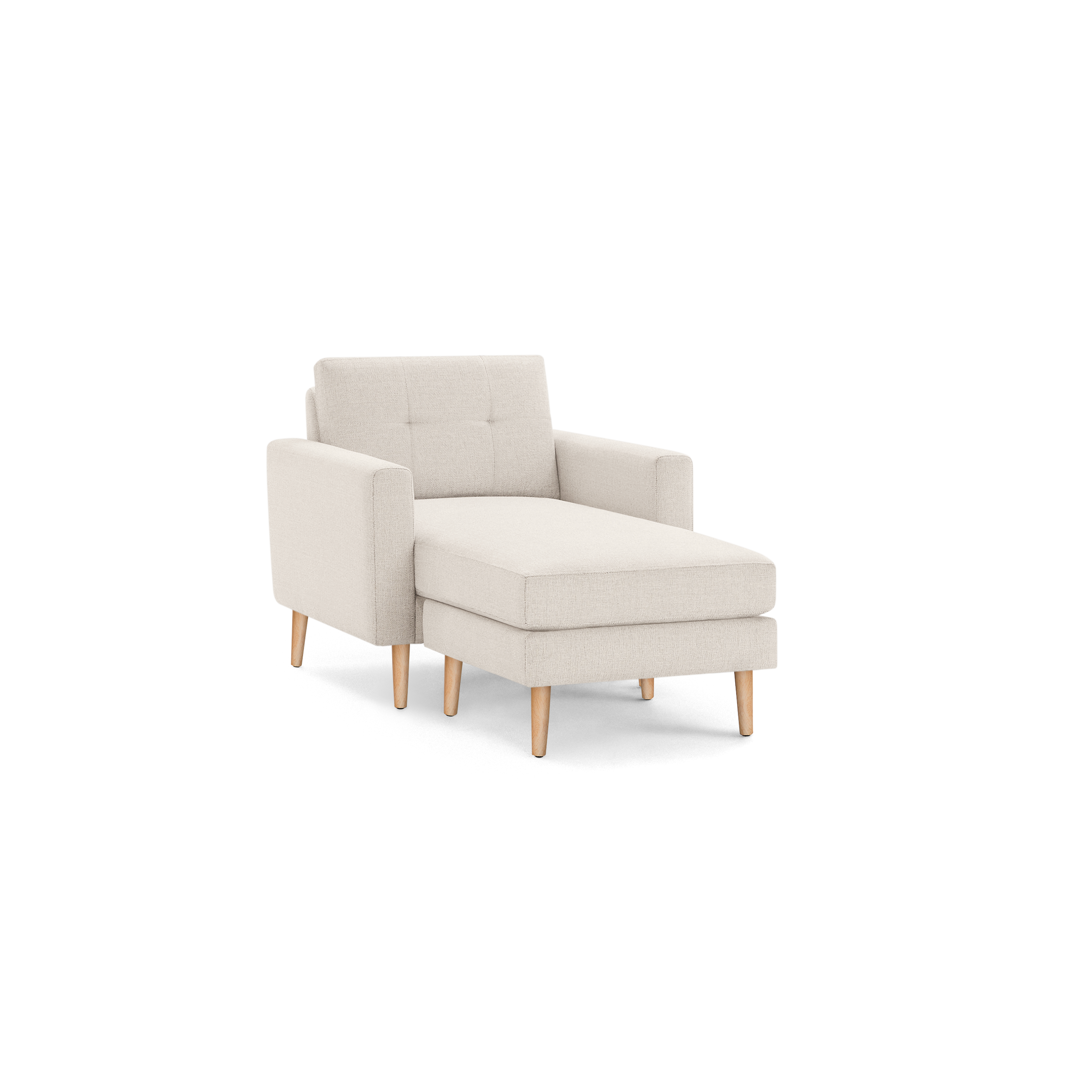 Beige upholstered armchair with button-tufted backrest, cushioned chaise lounge, and light wooden tapered legs, isolated on black background.
