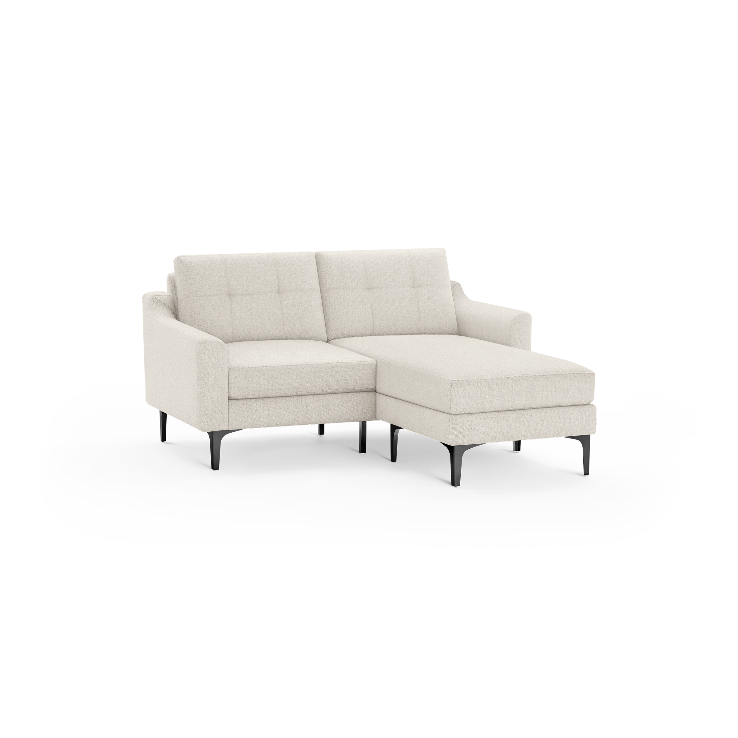 Beige fabric sectional sofa with tufted back cushions, right chaise, rounded arms, and black tapered legs.
