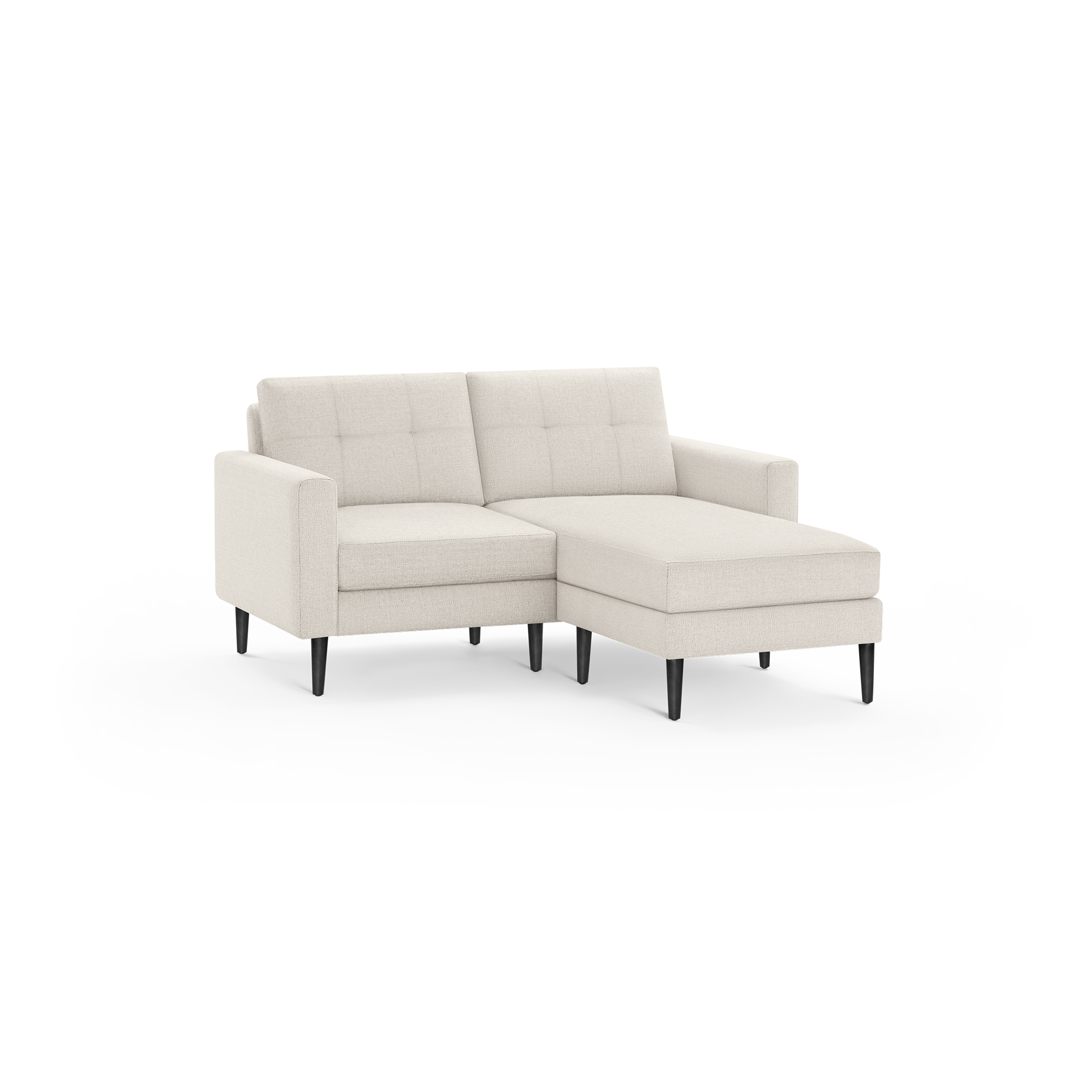 Beige upholstered sectional sofa with tufted back cushions, armrests, and dark wooden tapered legs on a black background.