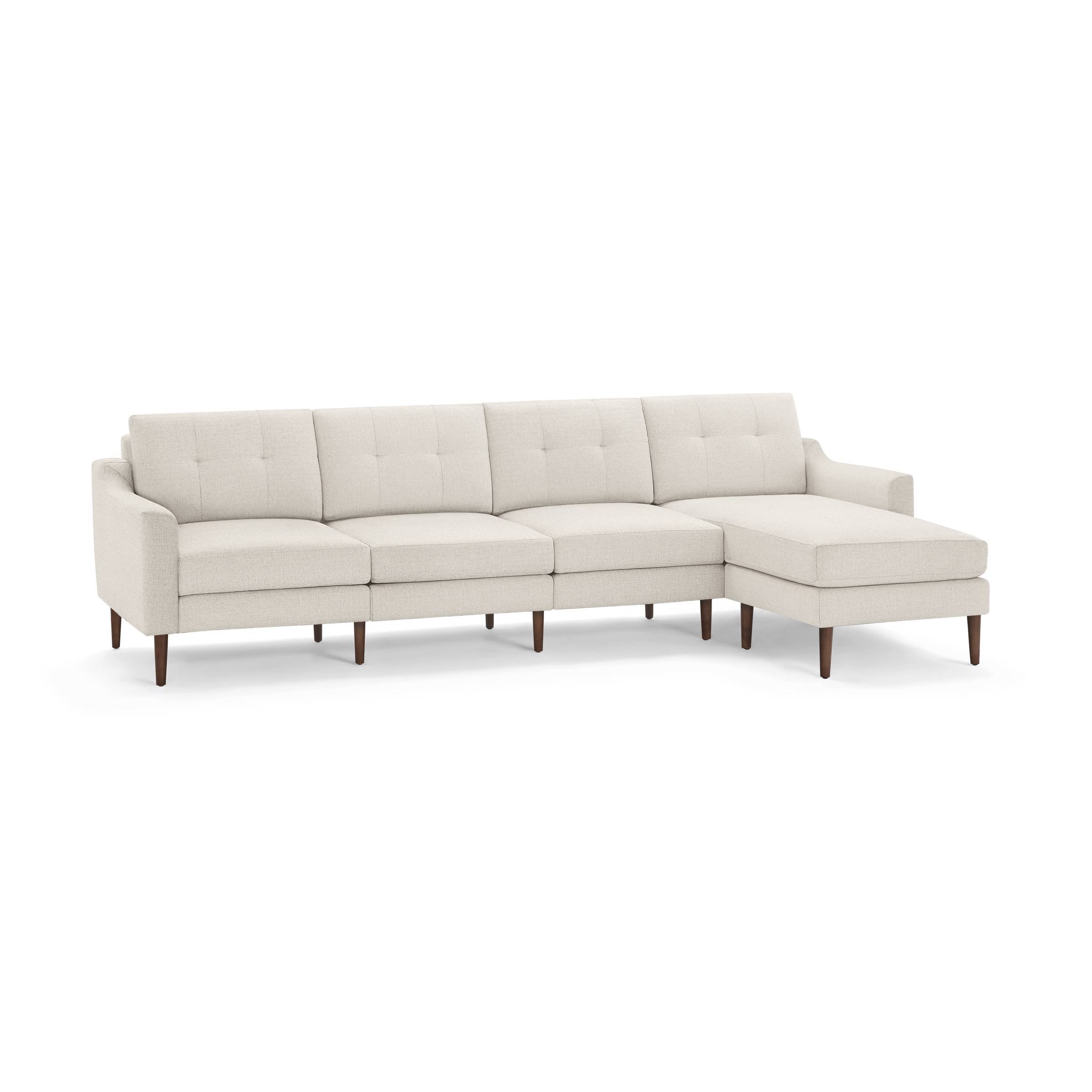 Beige mid-century sectional sofa with tufted cushions, wooden legs, and a right-side chaise lounge.
