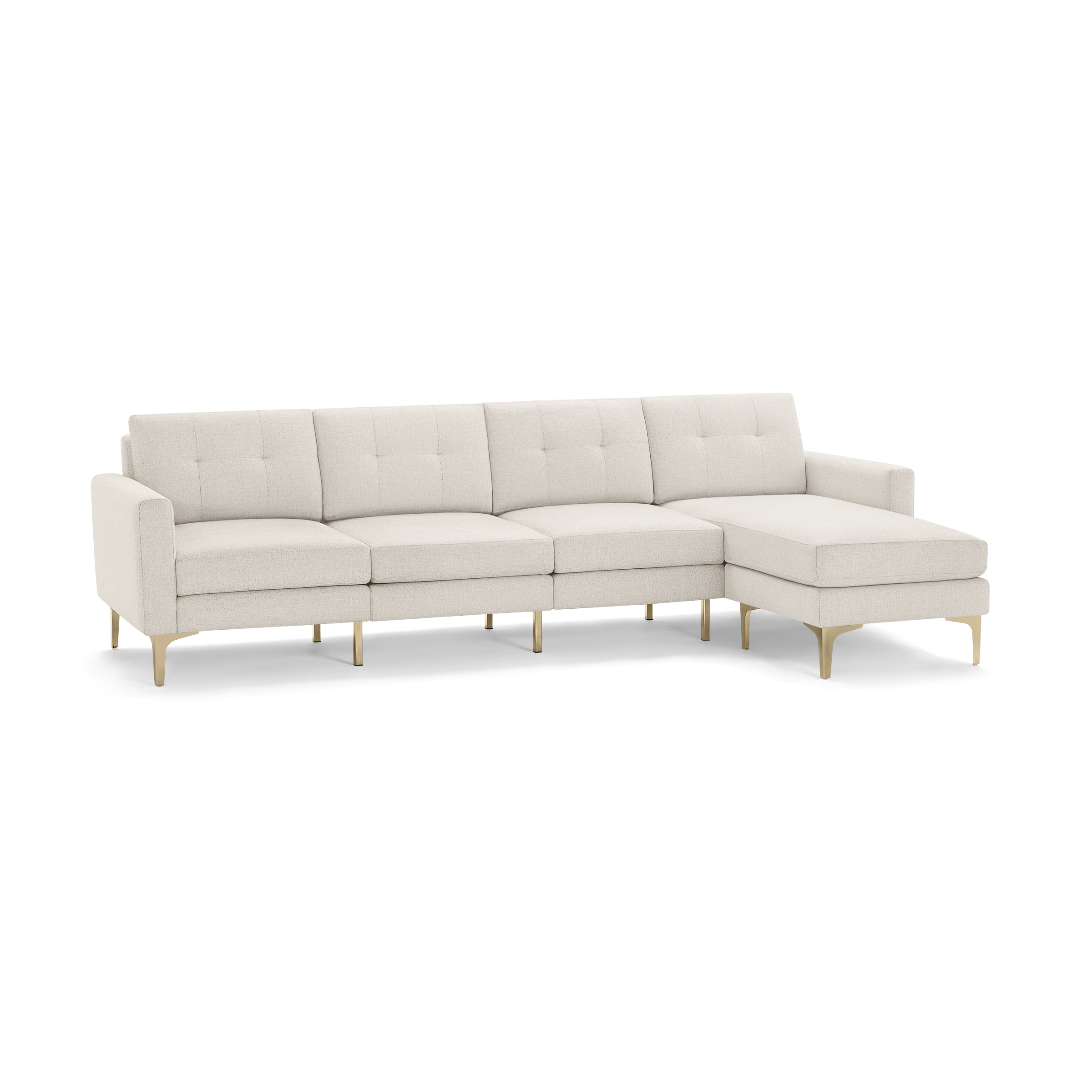 Modern beige fabric sectional sofa with tufted back cushions, gold metal legs, and chaise lounge on the right side, designed for spacious seating.