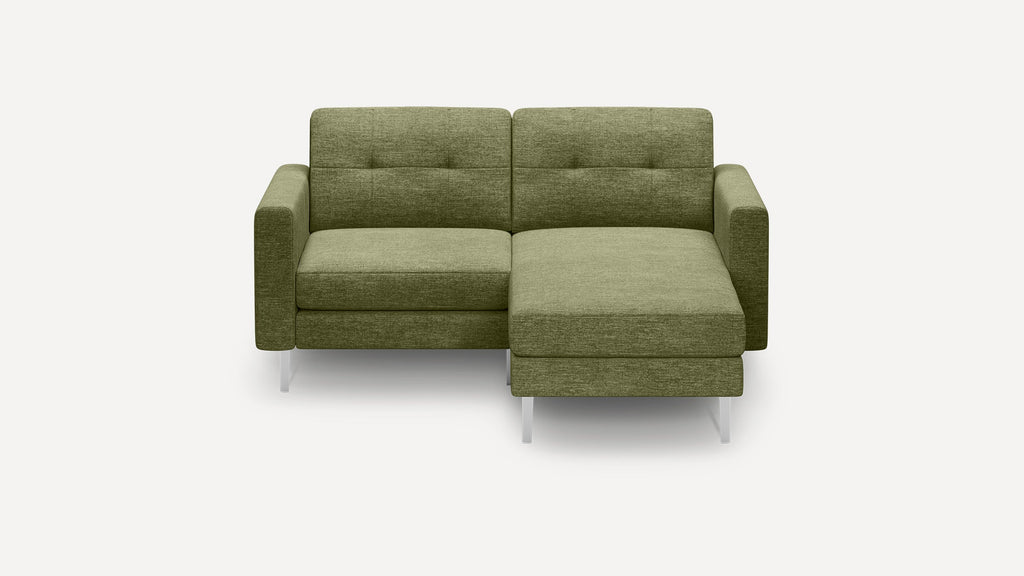 Modern olive green upholstered chaise lounge sofa with clean lines, tufted back cushions, square arms, and metal legs on white background.