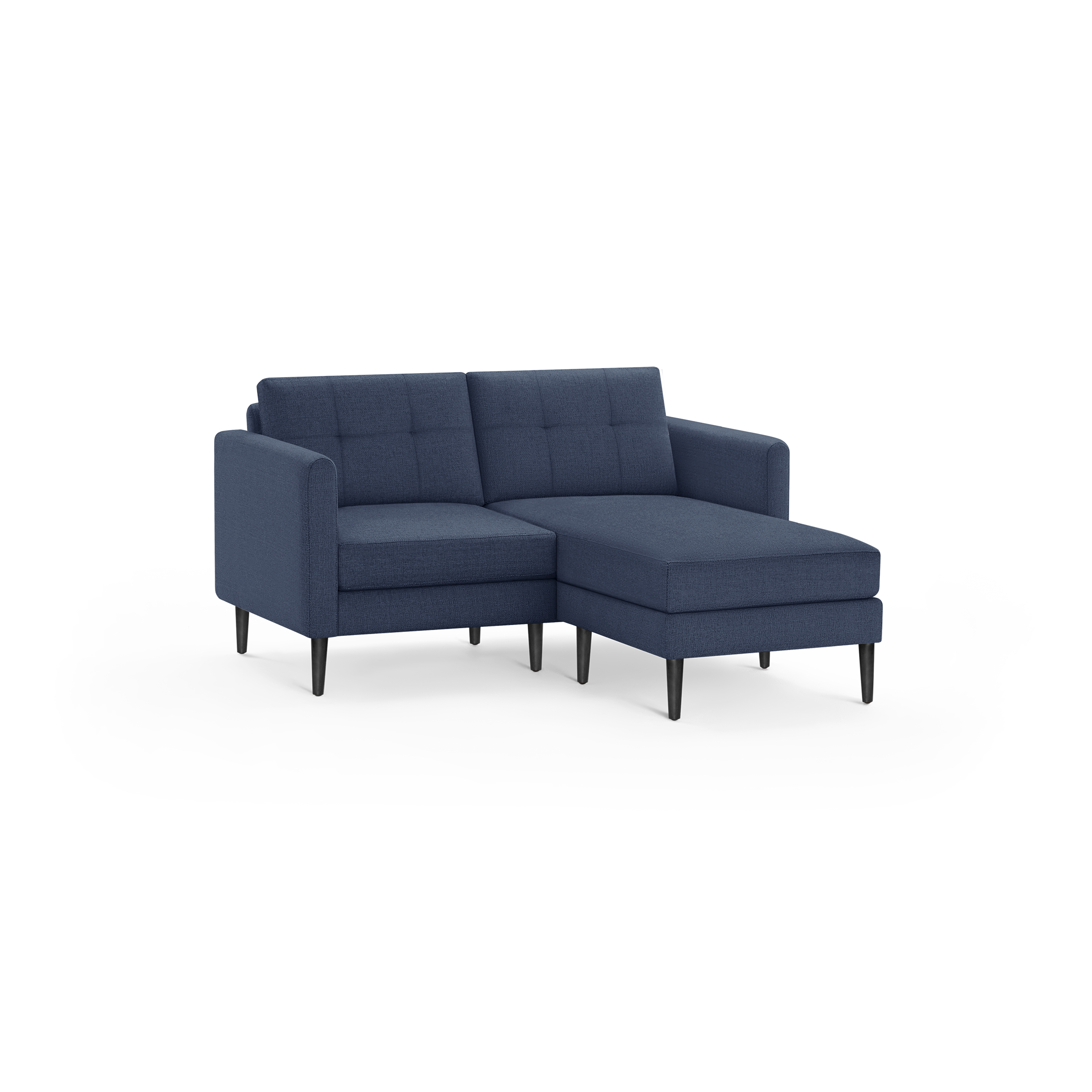 Blue upholstered sectional sofa with chaise lounge, tufted back cushions, and slender black tapered legs.