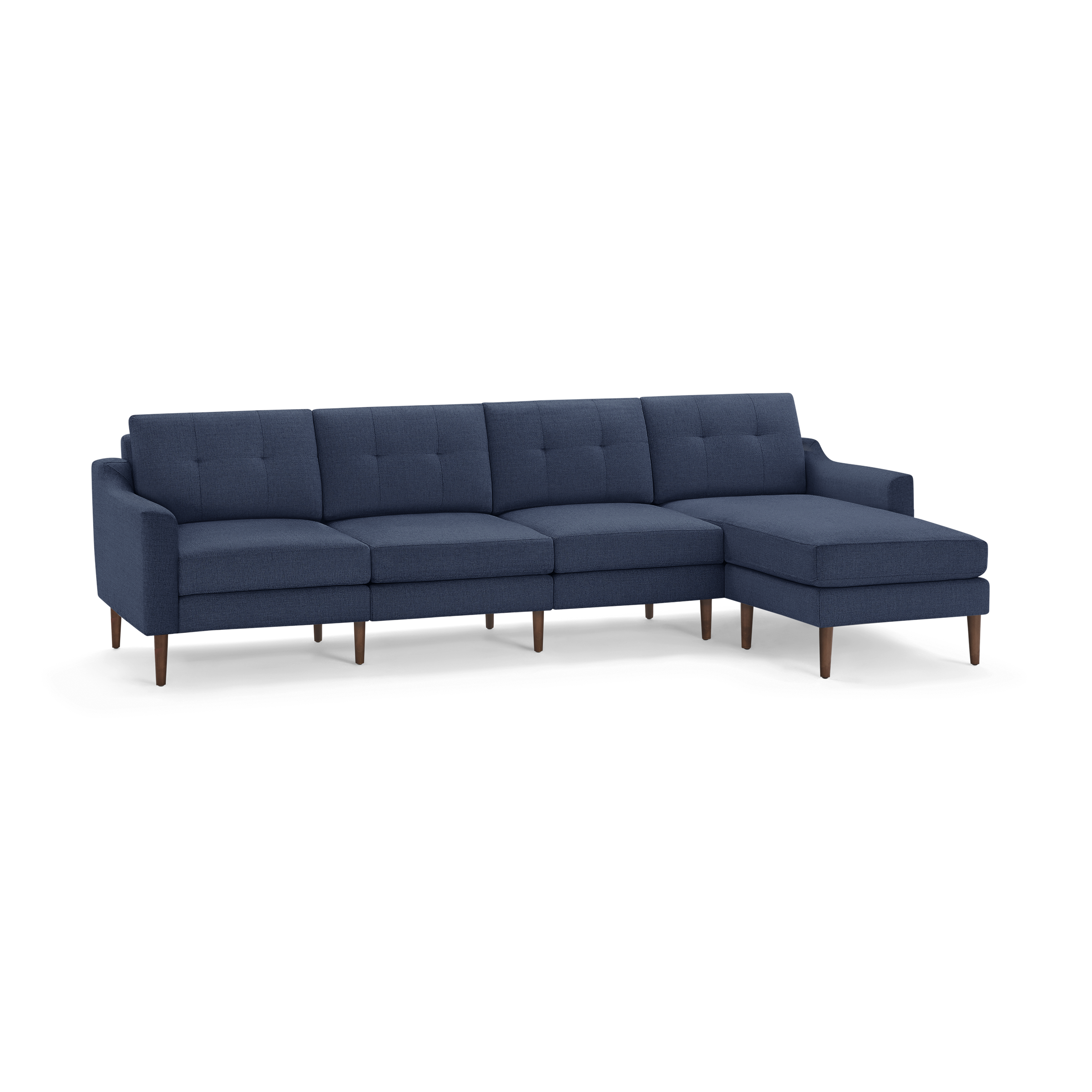 Mid-century modern sectional sofa in navy blue fabric with tufted back cushions and wooden legs, featuring a right-side chaise lounge.