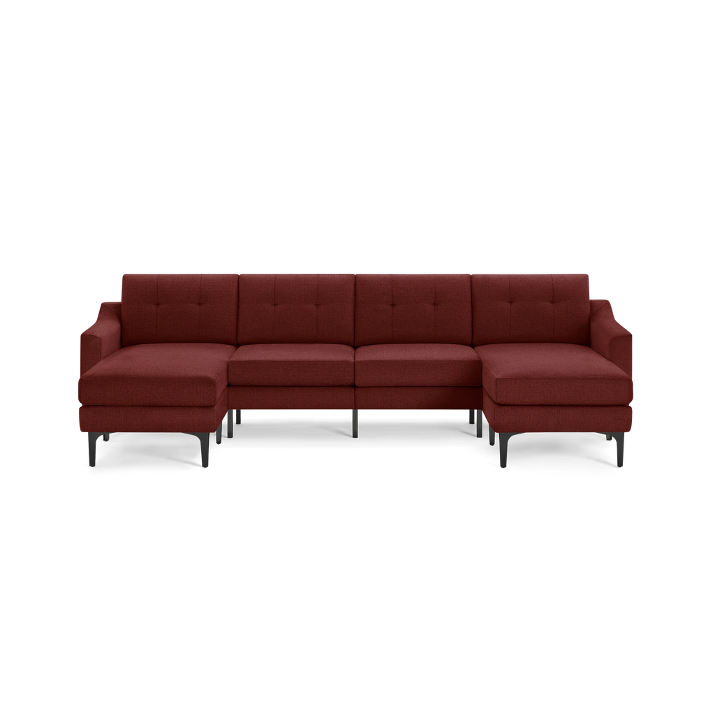 Modern sectional sofa with deep red fabric upholstery, tufted back cushions, and black slender legs, featuring left and right chaise ends.