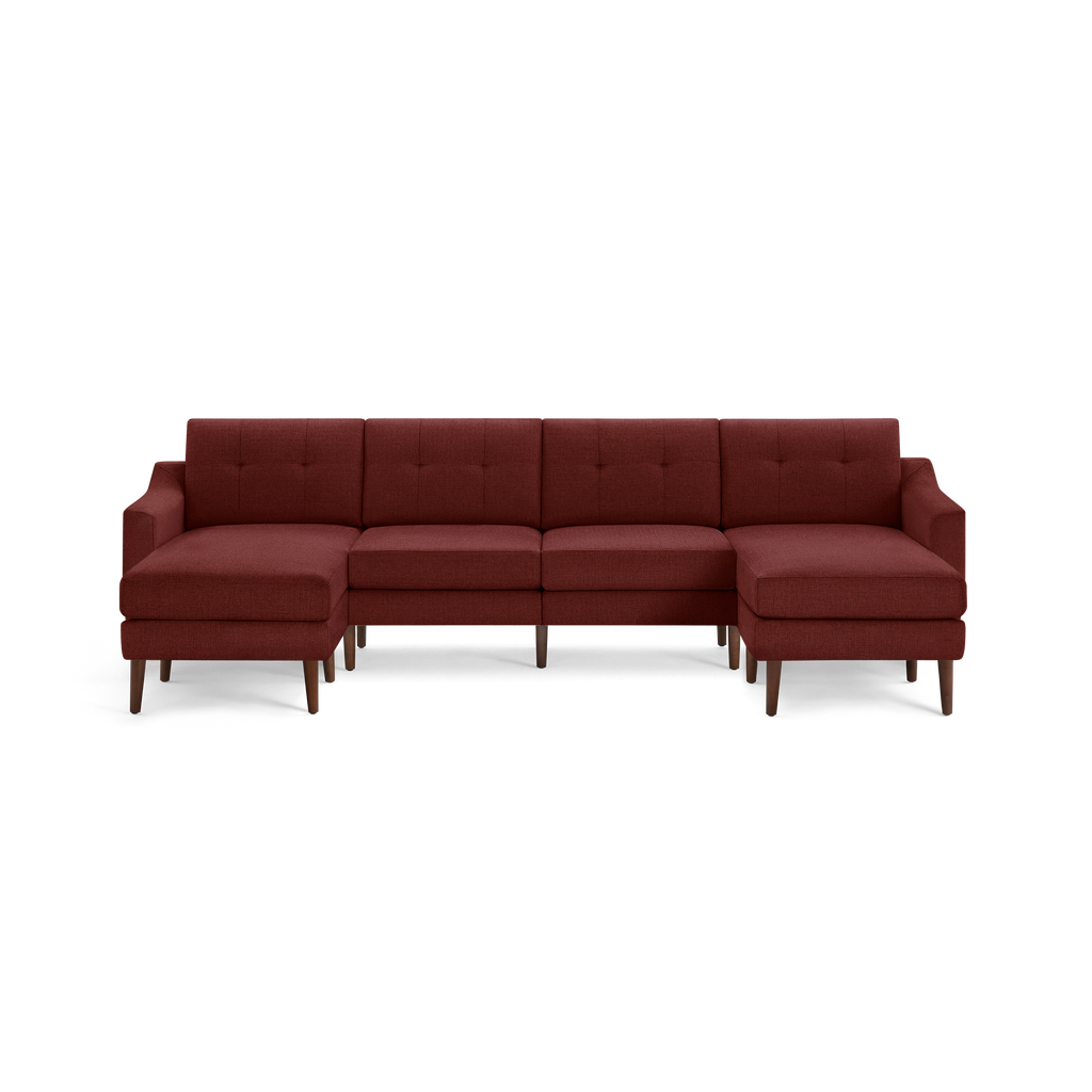 Modern L-shaped sectional sofa in dark red fabric with tufted back cushions and wooden legs, featuring left and right chaise lounges.