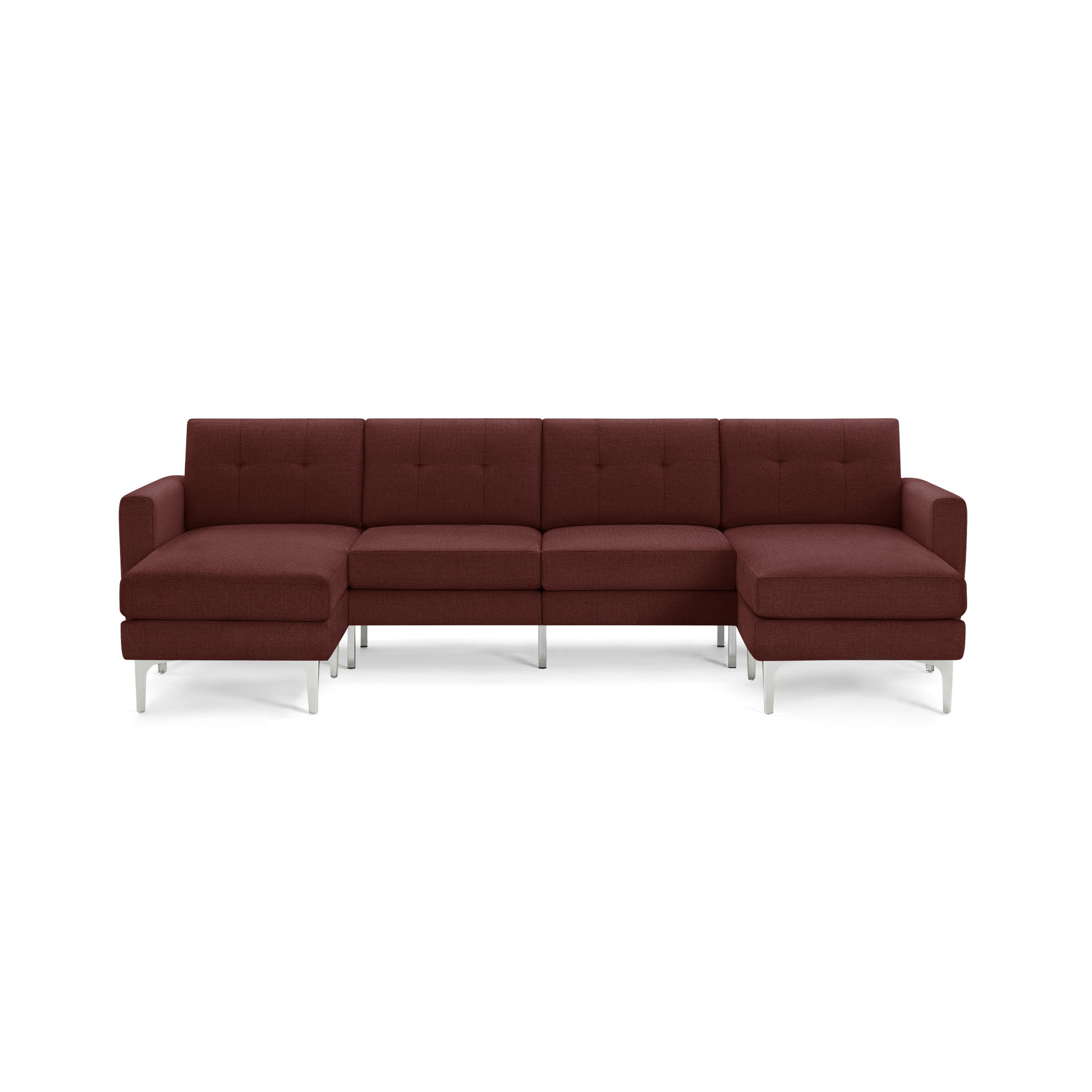 Modern sectional sofa in deep red fabric with tufted cushions, metal legs, and chaise lounges on both sides.