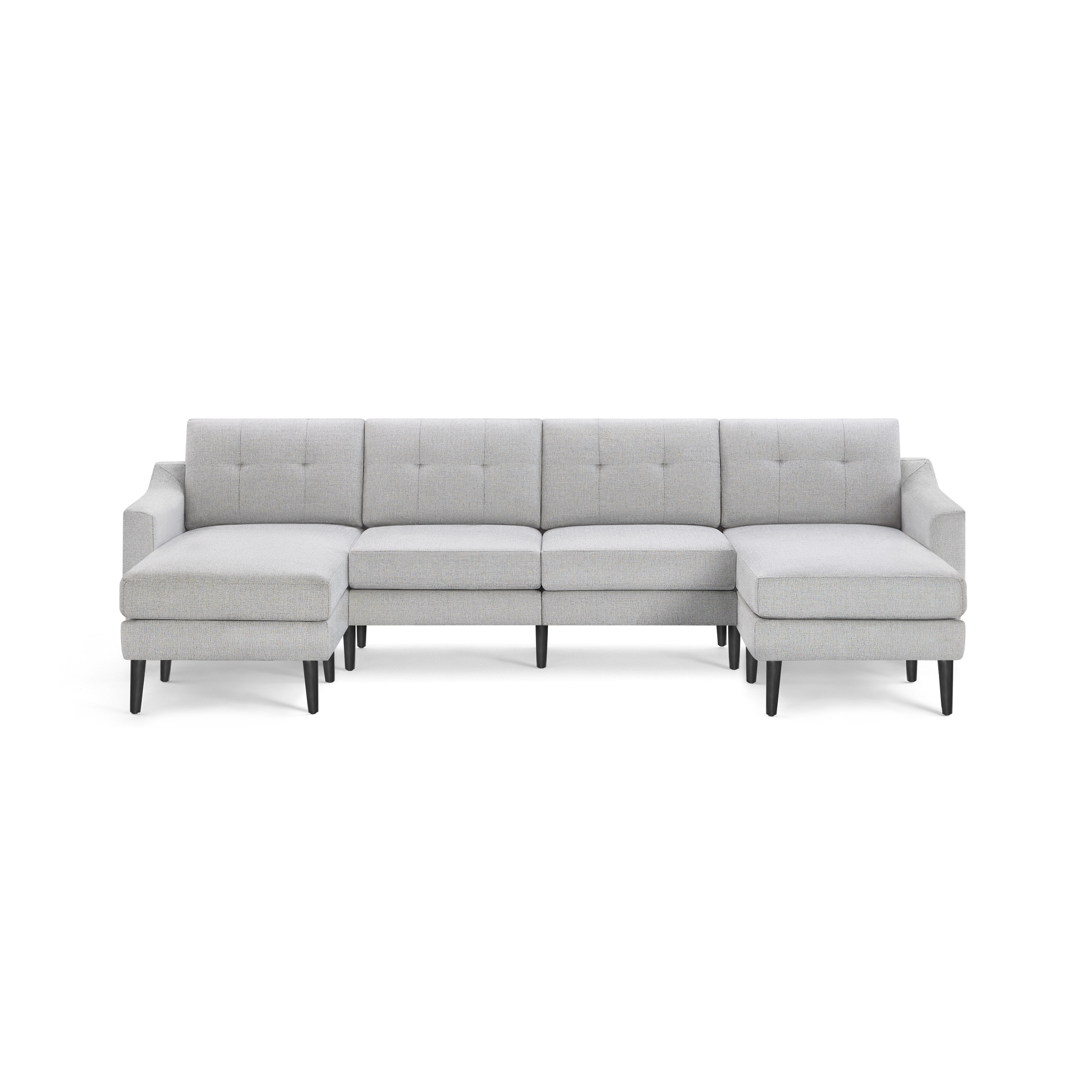 Light gray, modern sectional sofa with tufted back cushions, two chaise lounges on either side, and black tapered legs.