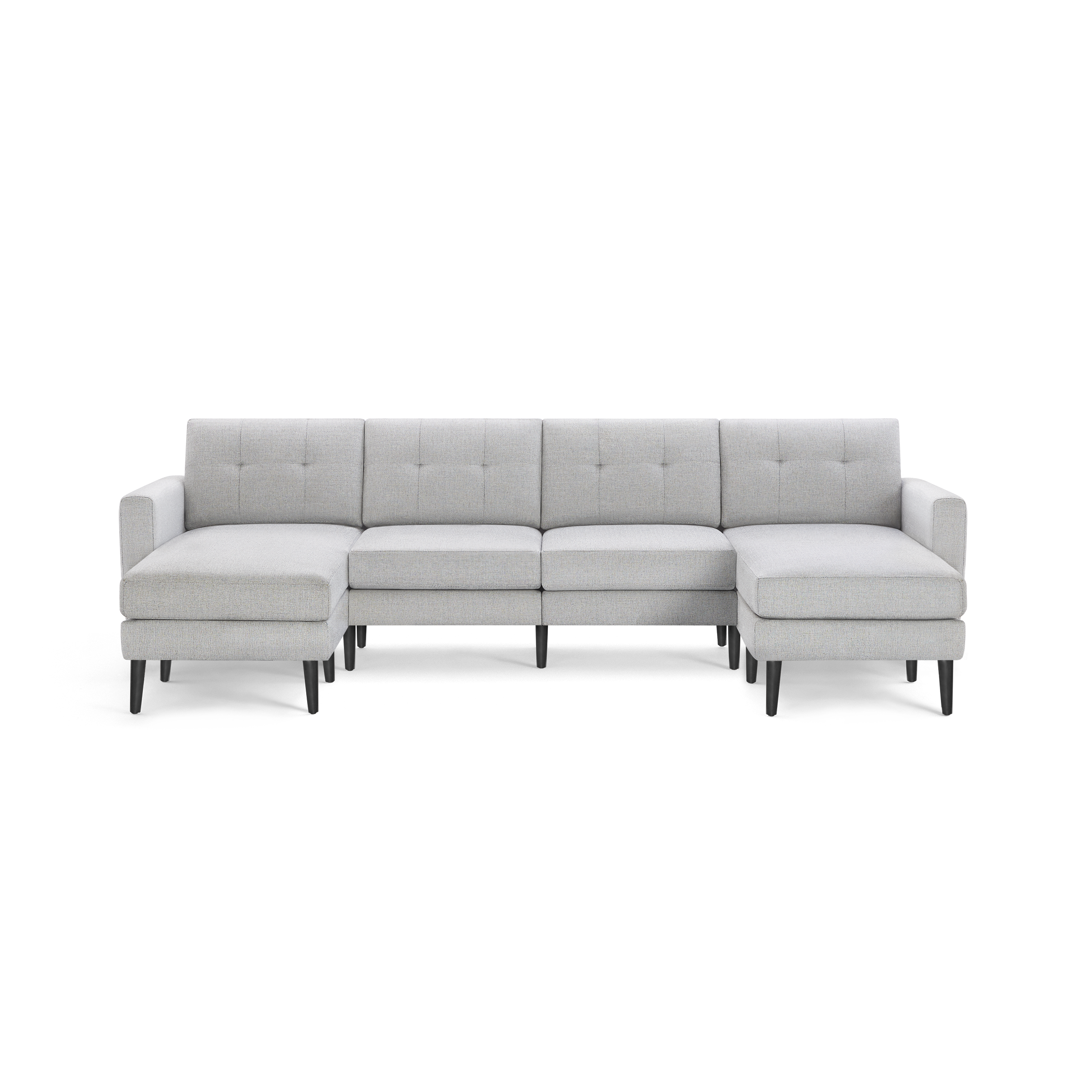 Modern sectional sofa in light gray fabric with tufted back cushions, black tapered legs, and symmetrical chaise ends.