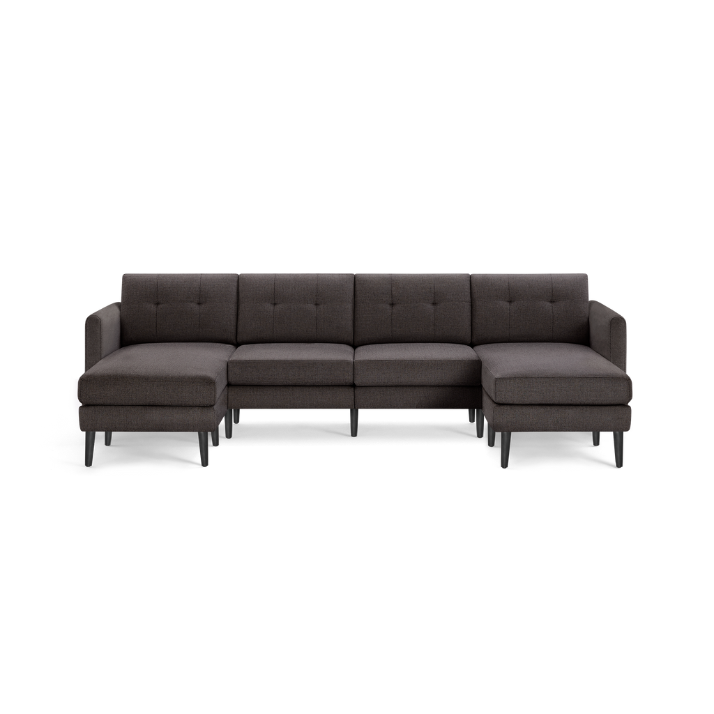 Dark gray modern sectional sofa with tufted back cushions, two chaise lounges on each end, and black tapered legs.