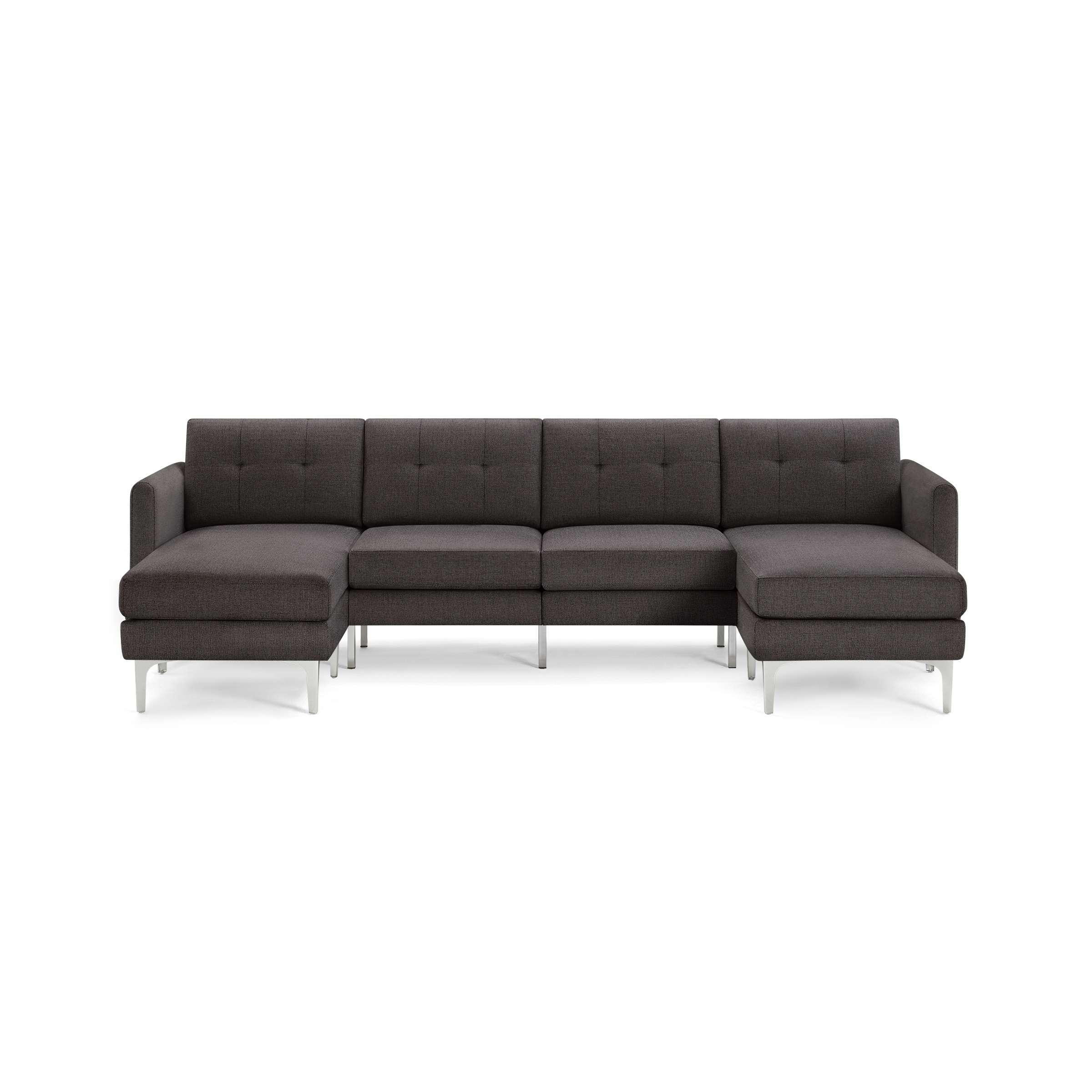Dark gray fabric sectional sofa with tufted backrest, metal legs, and chaise lounge on both ends, modern design.