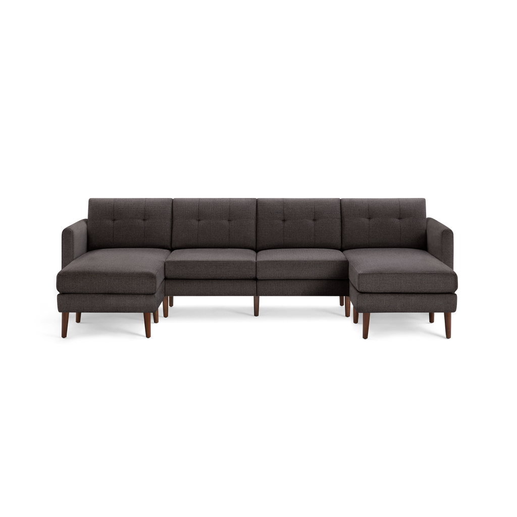 Modern dark gray sectional sofa with tufted back cushions, wooden legs, and chaise lounges on both ends, designed for spacious seating.