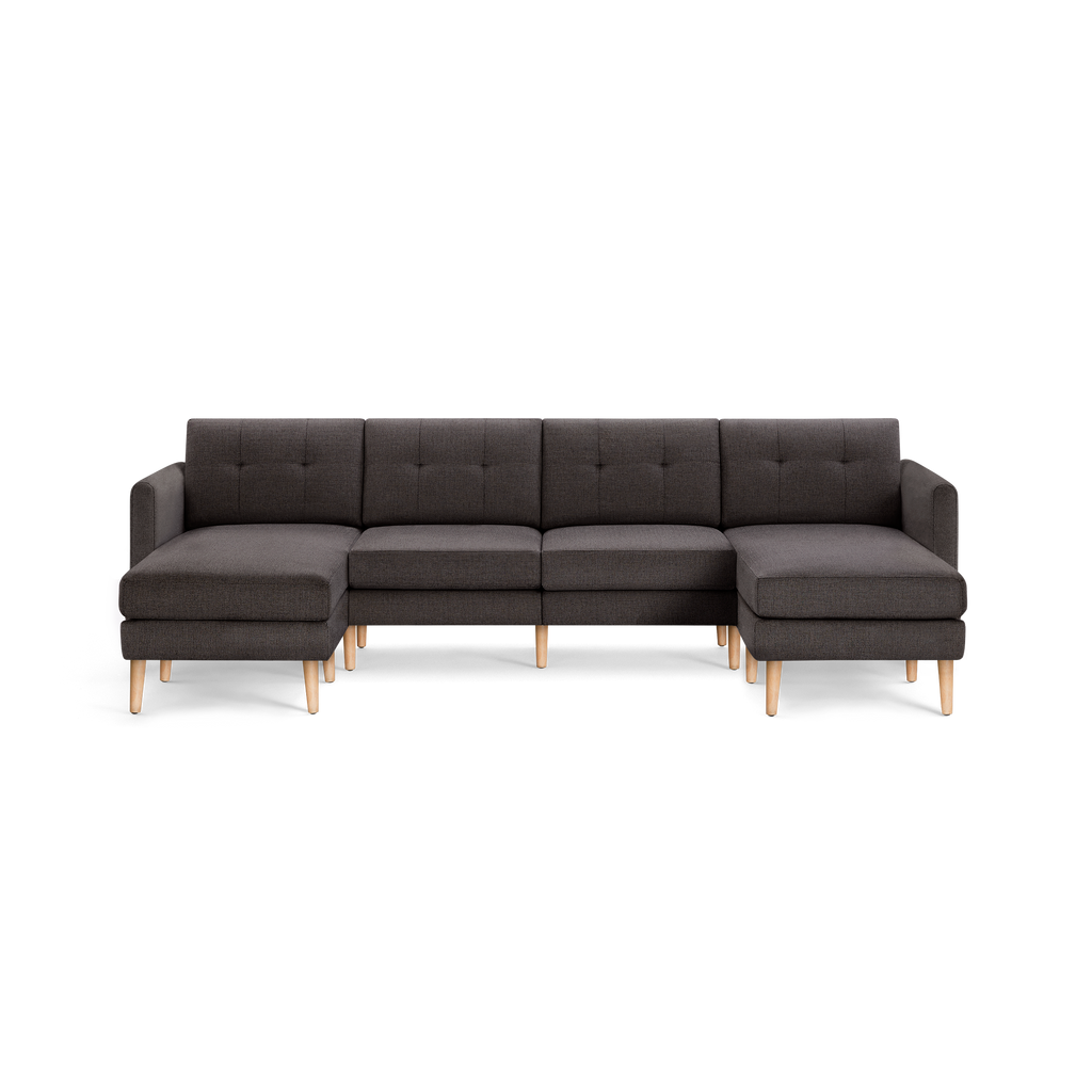 Dark gray modern sectional sofa with tufted cushions and light wooden legs, featuring left and right chaise lounge ends.