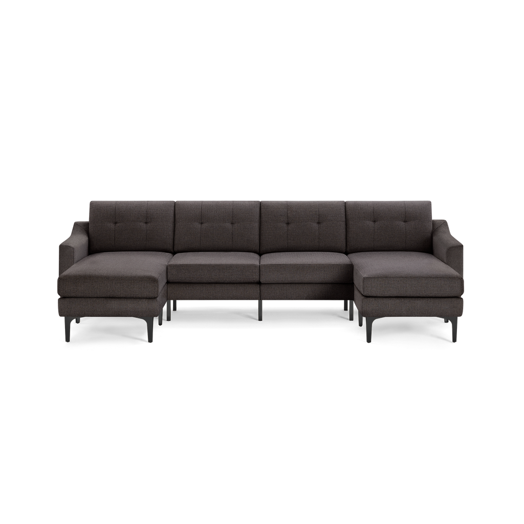 Modern dark gray fabric sectional sofa with tufted backrests, low arms, and black metal legs, including left and right chaise lounges.