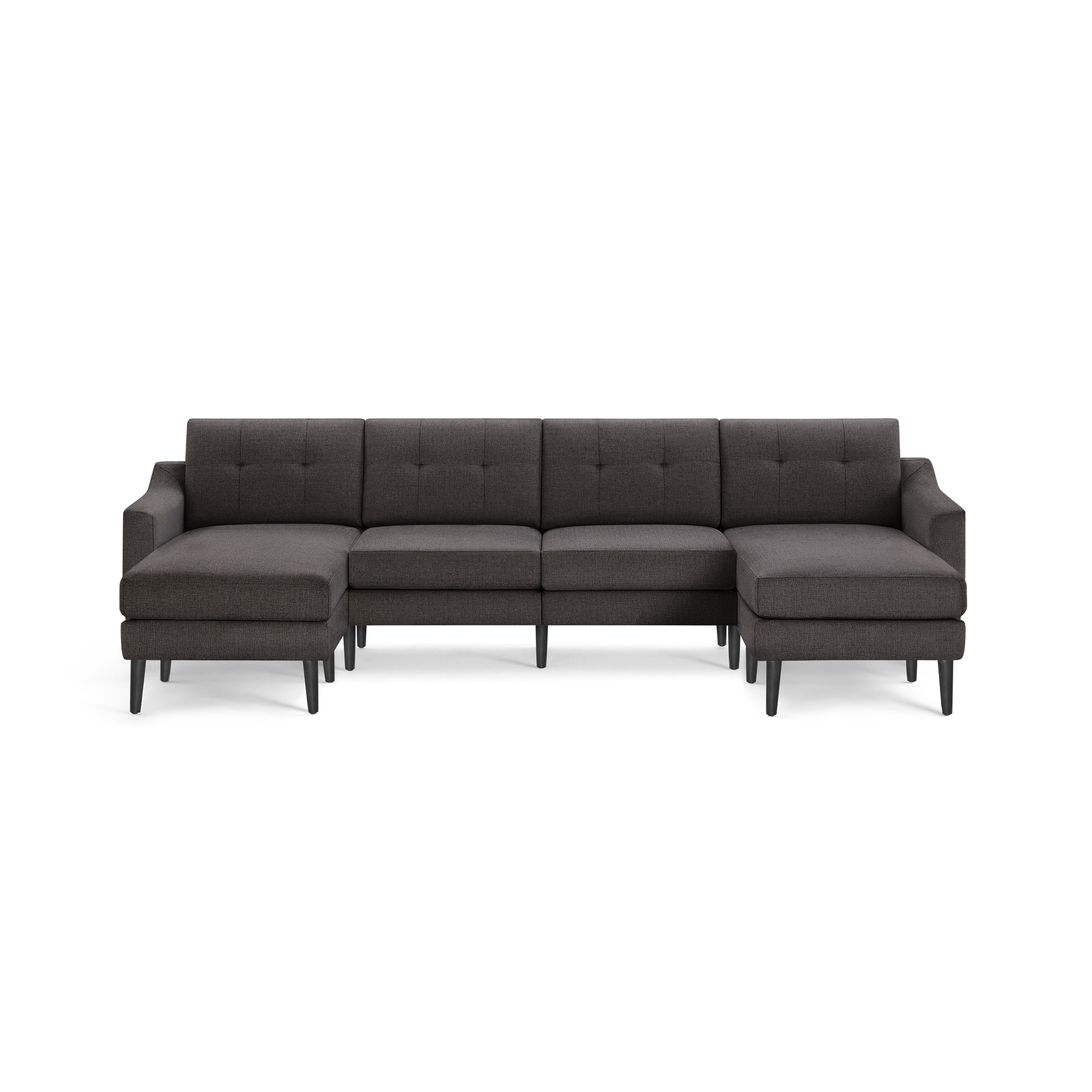 Dark gray fabric sectional sofa with tufted back cushions, L-shaped design, and black tapered wooden legs.