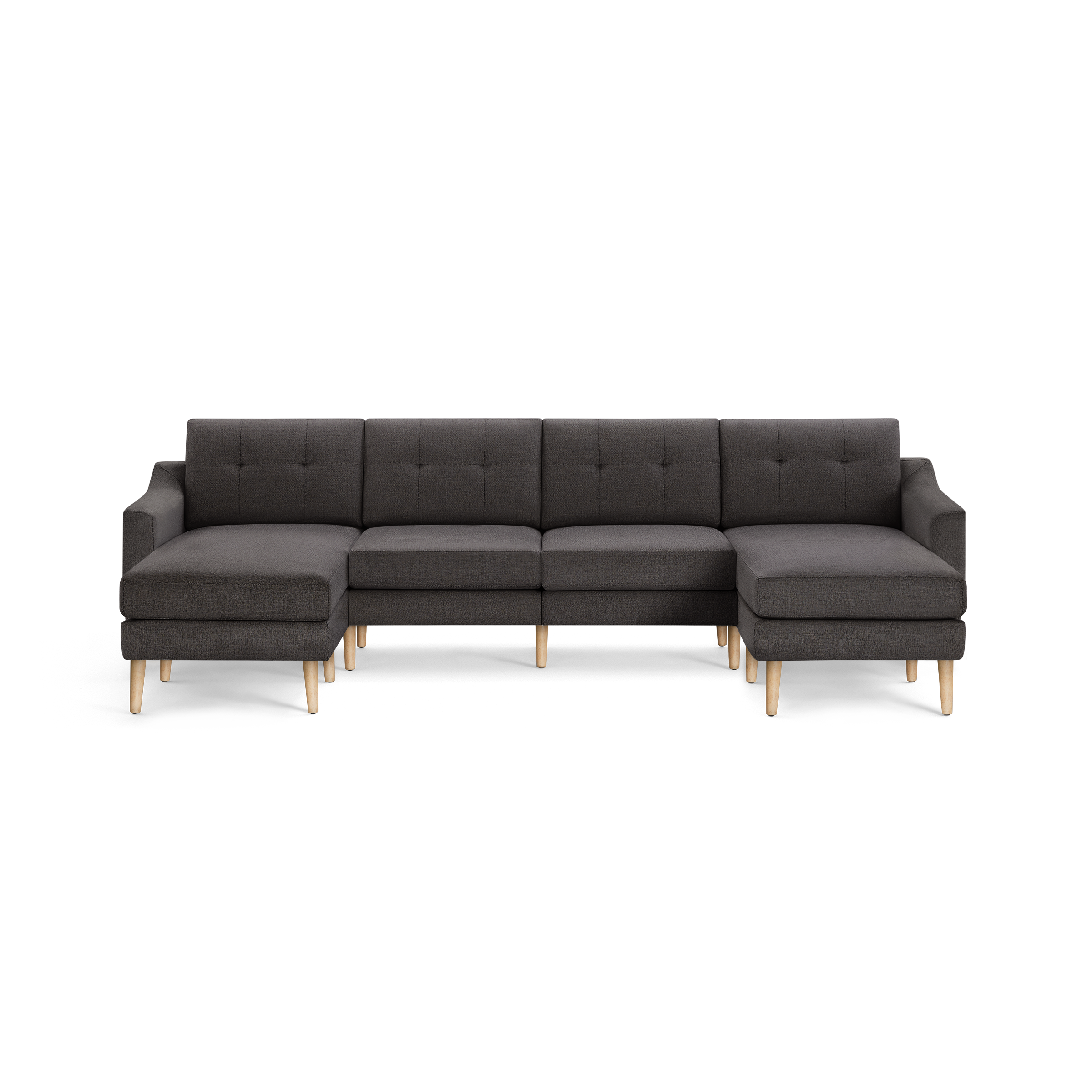 Dark gray mid-century modern sectional sofa with button-tufted back cushions and light wooden legs.