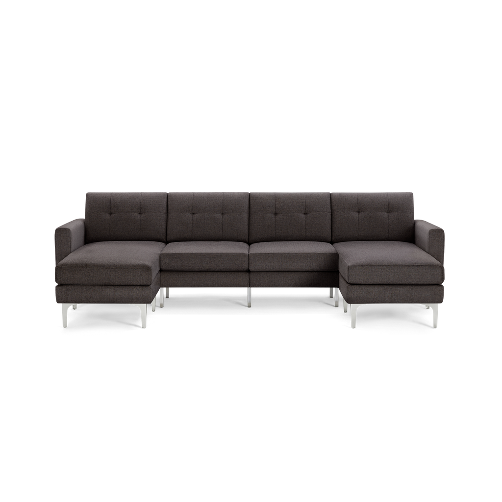 Modern dark gray sectional sofa with tufted back cushions, right and left chaise lounges, and metal legs.