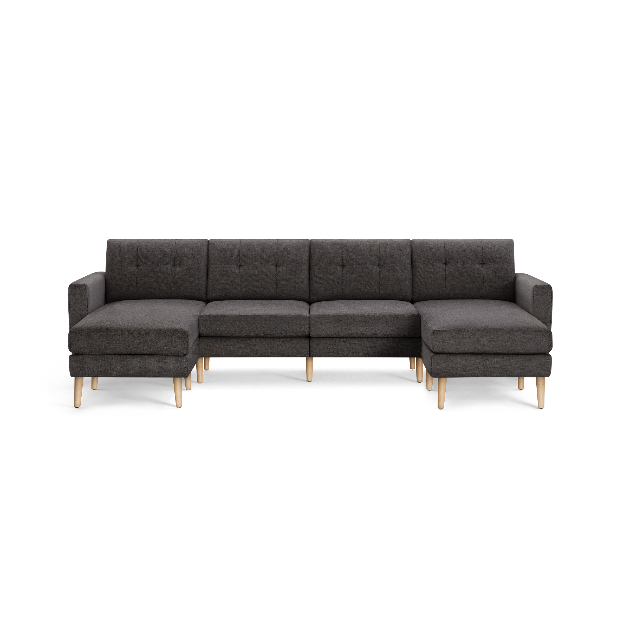 Dark gray L-shaped sectional sofa with tufted back cushions, wooden legs, and armrests on both ends, modern design.