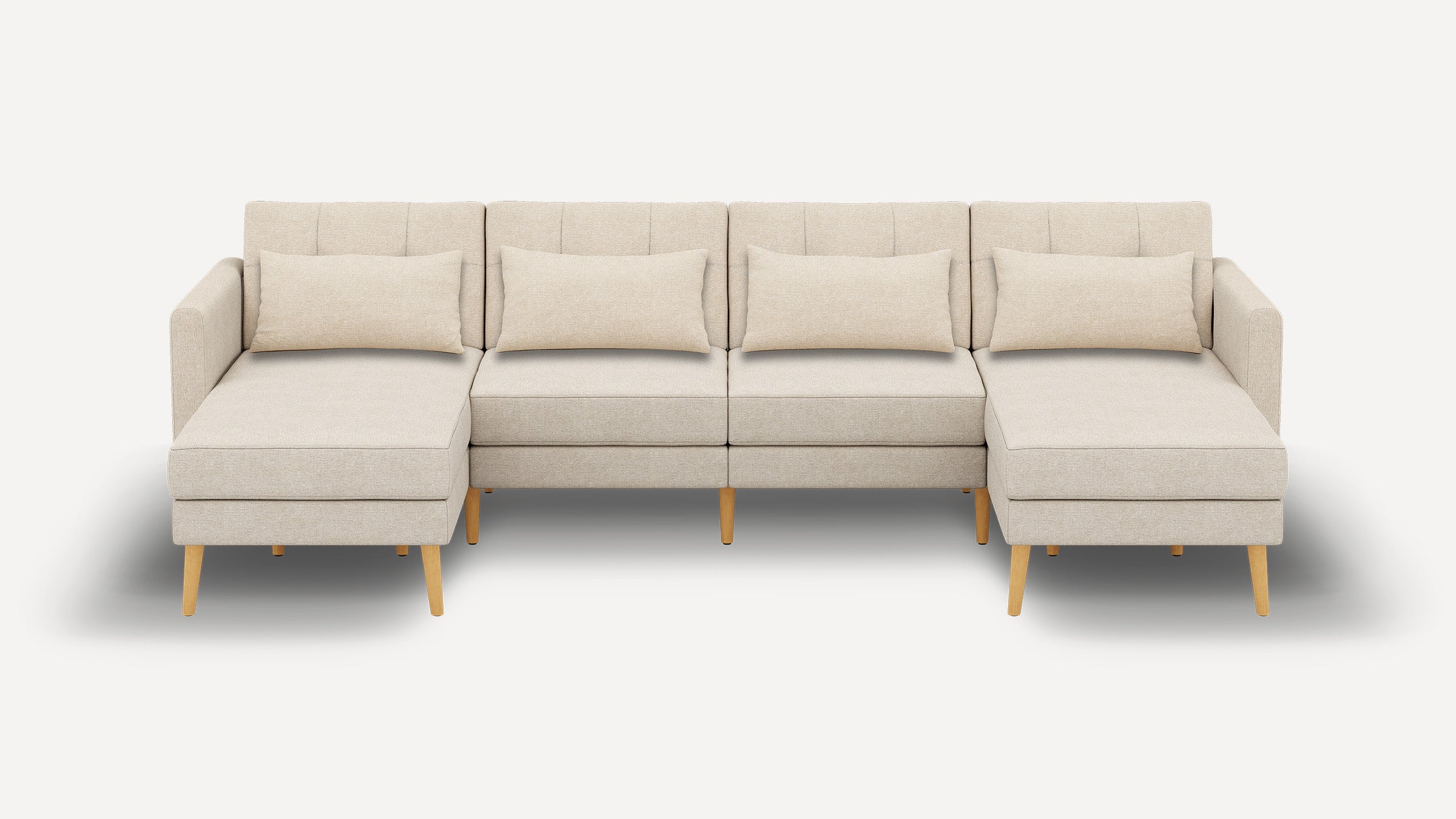 Beige modern sectional sofa with wooden legs, featuring a middle seating area and two chaise lounges on either end, each with a rectangular cushion.