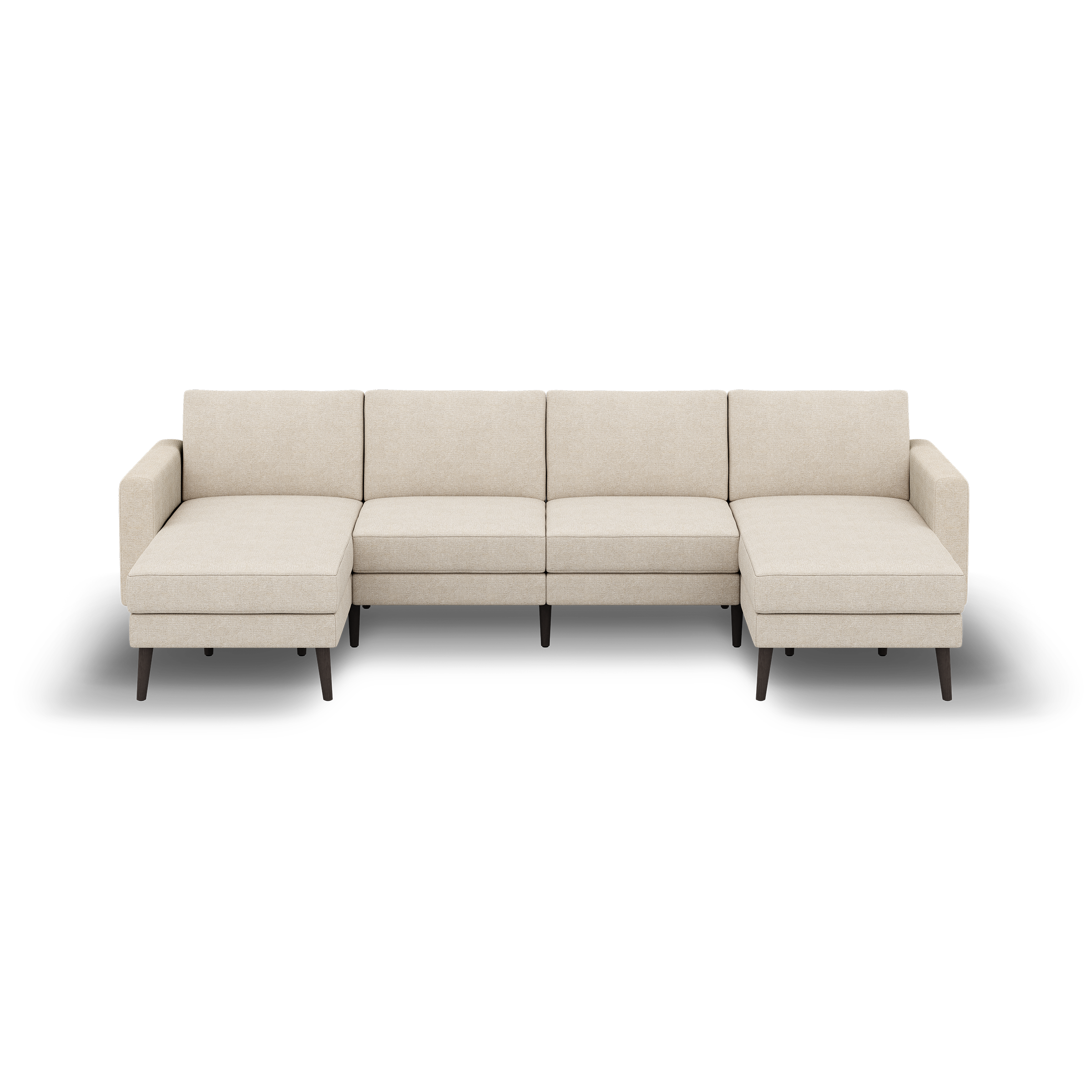 Beige fabric sectional sofa with chaise lounges on both ends, straight backrests, and dark wooden legs on black background.