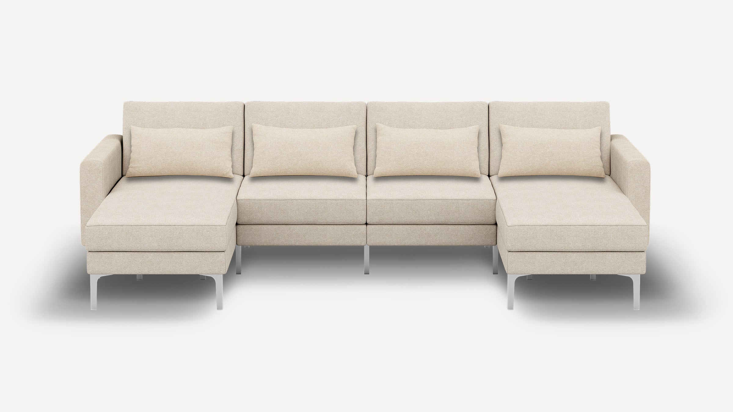 Beige modern sectional sofa with metal legs, two chaise lounges on each end, and four matching lumbar pillows, against white background.