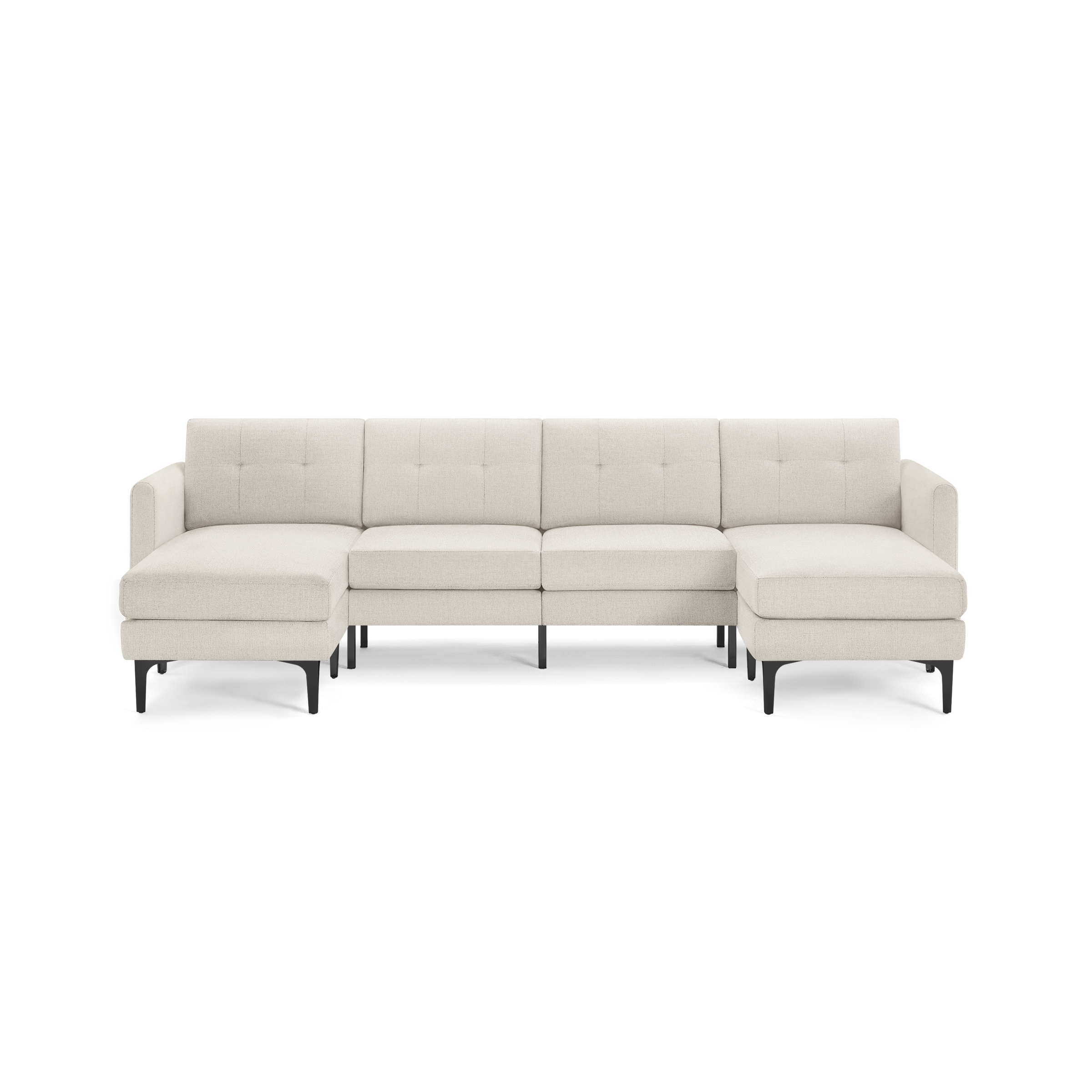Large modern beige fabric sectional sofa with tufted back cushions and black tapered legs, featuring two chaise lounges on each end.